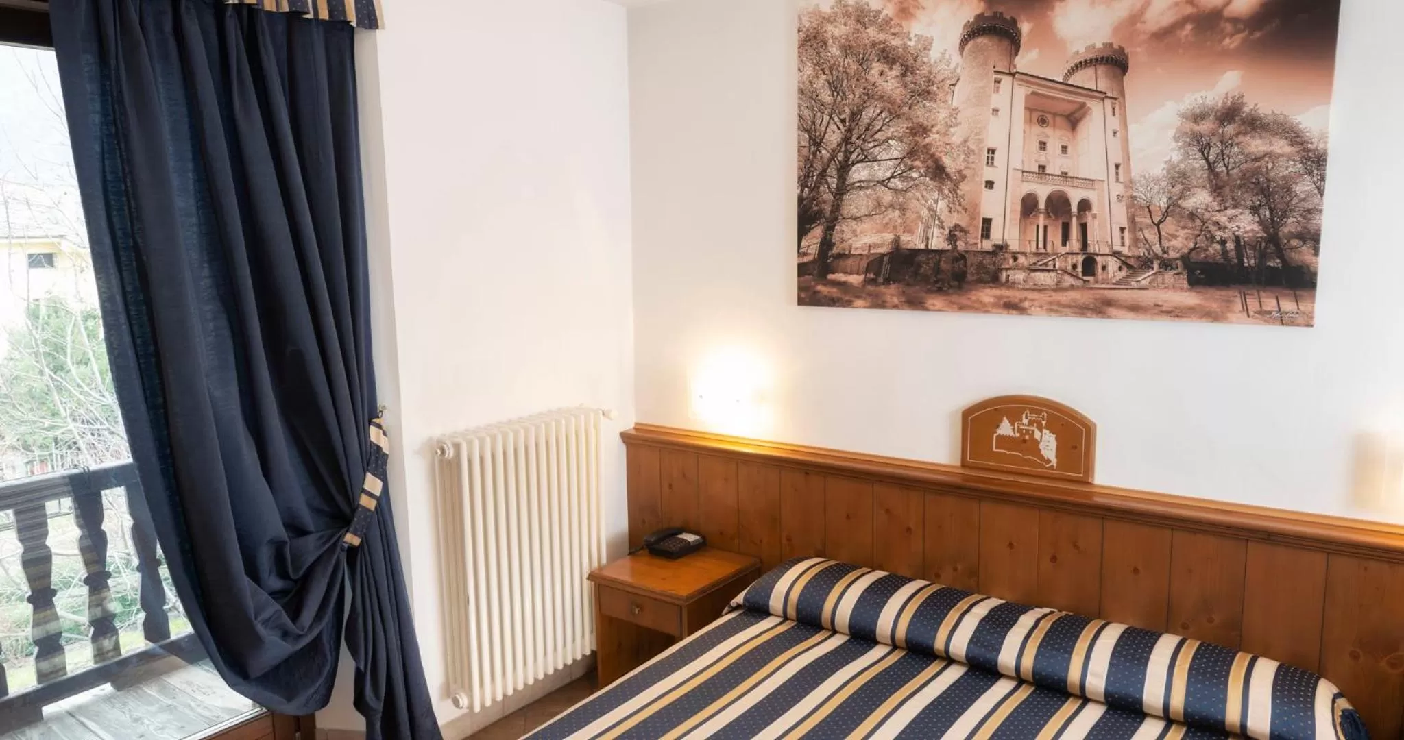 Bedroom in Hotel Residence Chateau