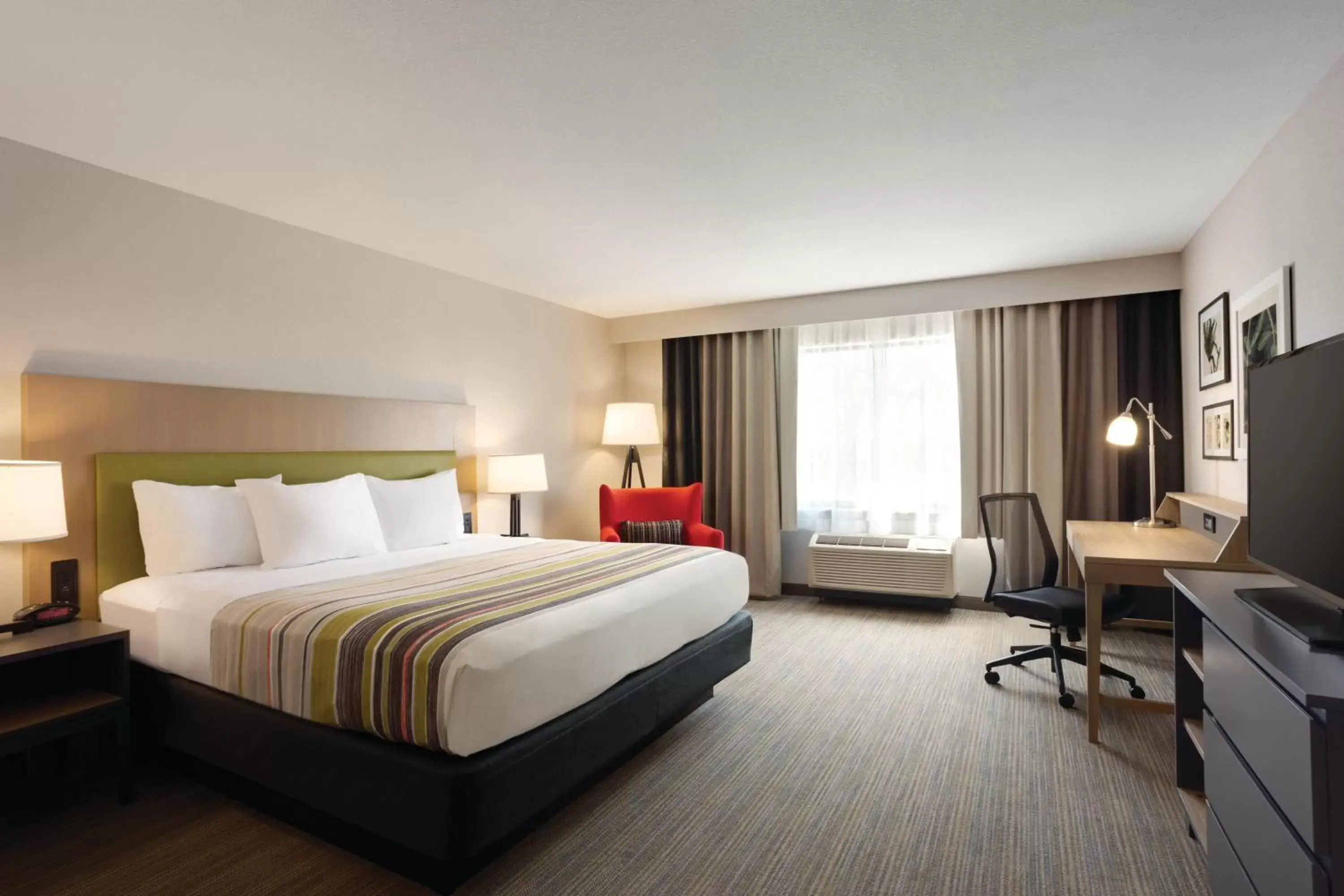 TV and multimedia in Country Inn & Suites by Radisson, Lawrence, KS