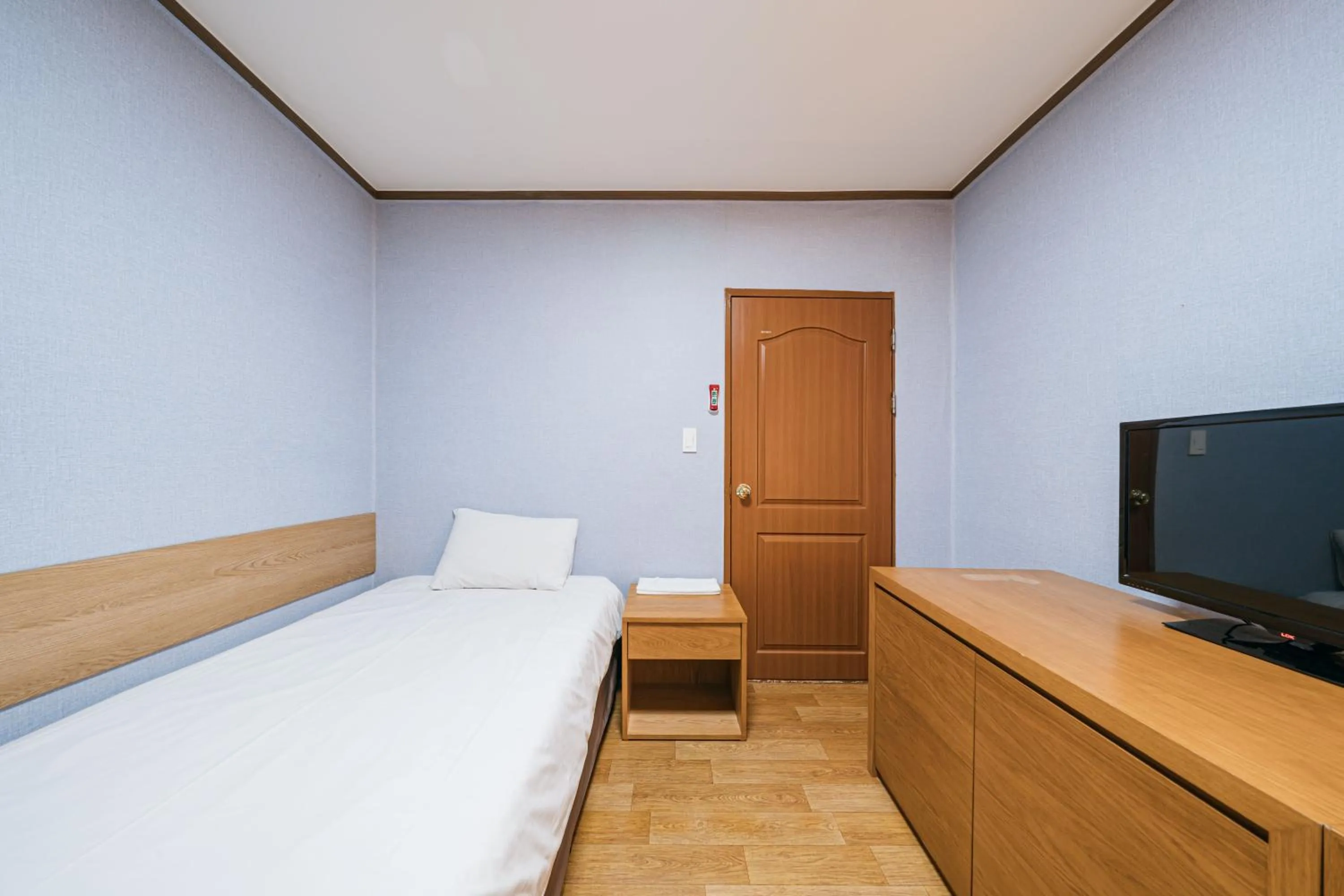 Bed in Jeju Miracle Hotel