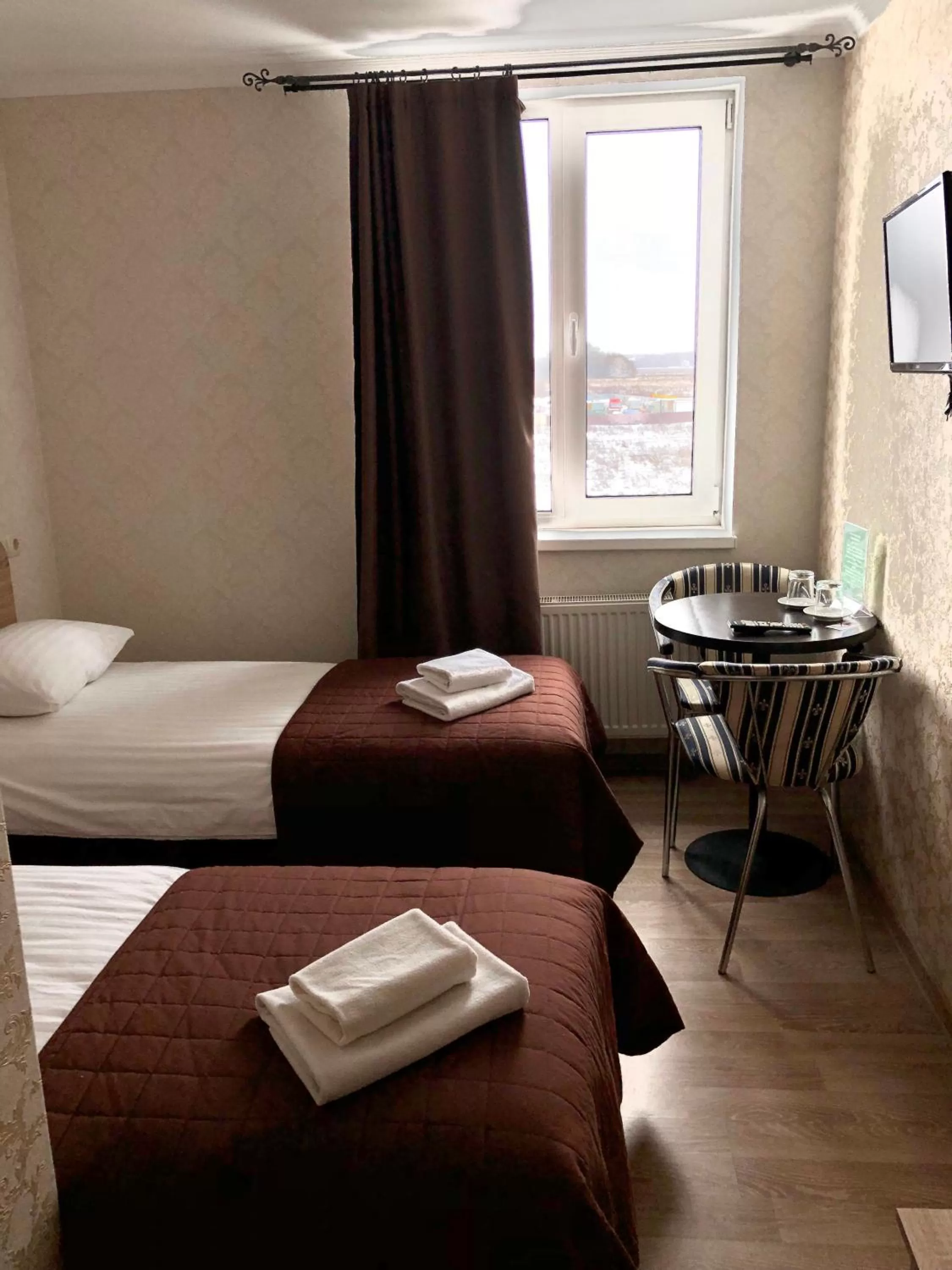 Bed in Zhuliany City Hotel