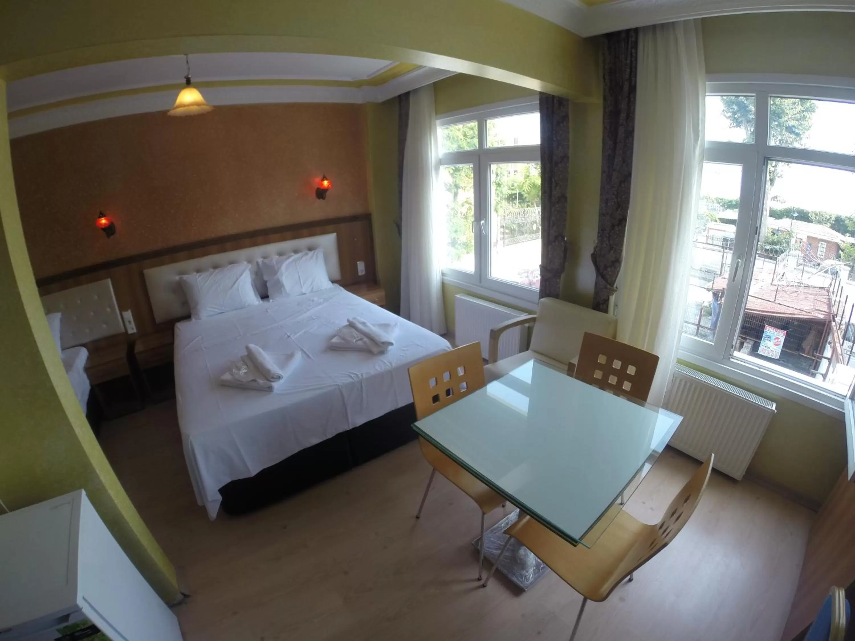 Living room, Bed in Arat Apartments