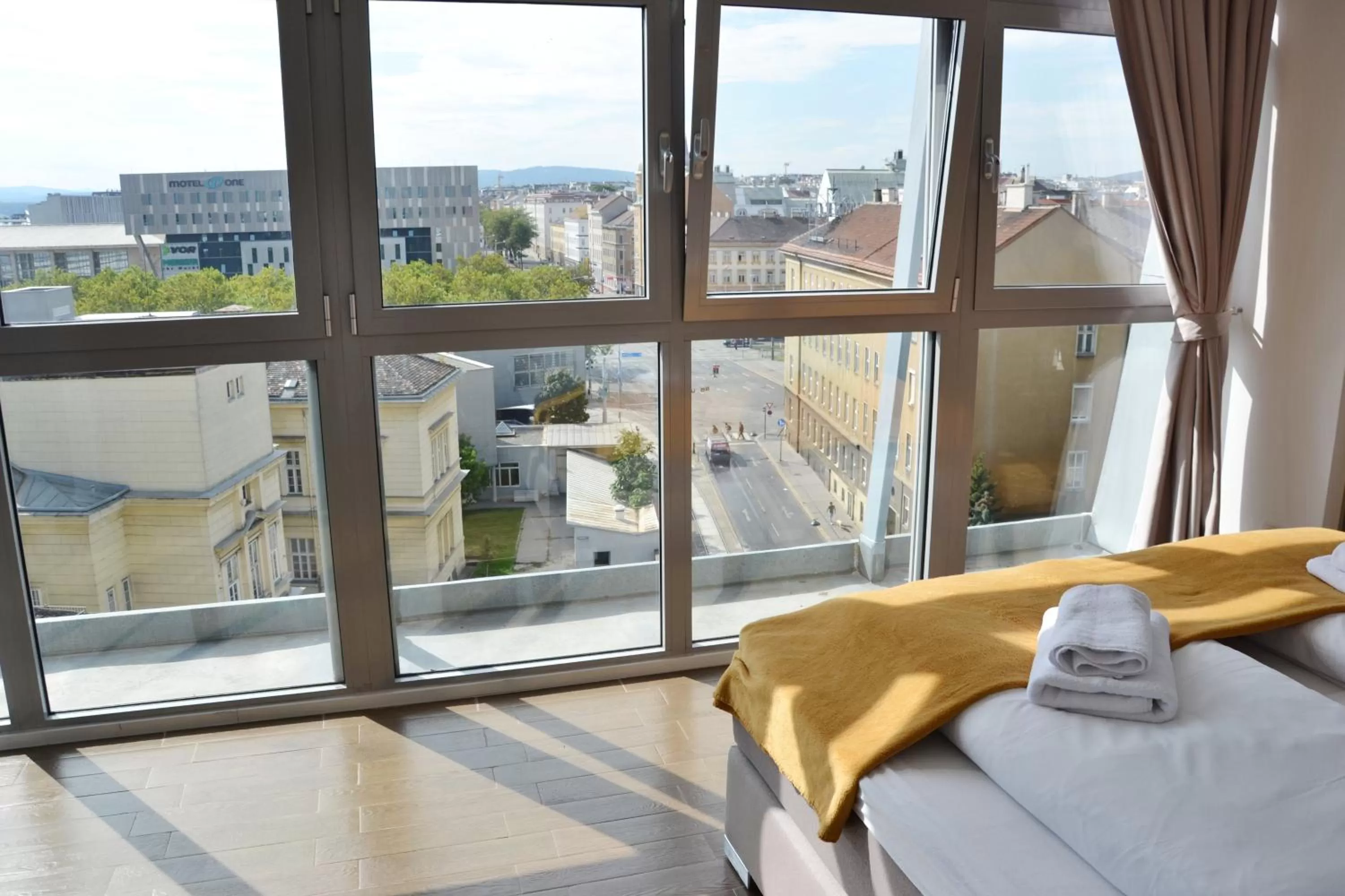 View (from property/room), Bed in Apollo Hotel Vienna