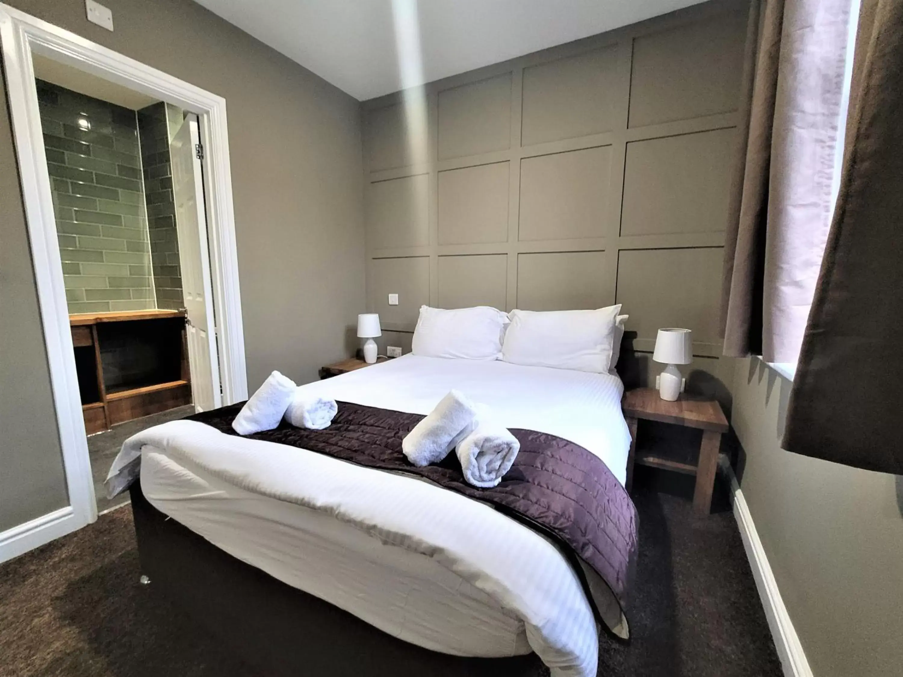 Bed in New County Hotel & Serviced Apartments by RoomsBooked