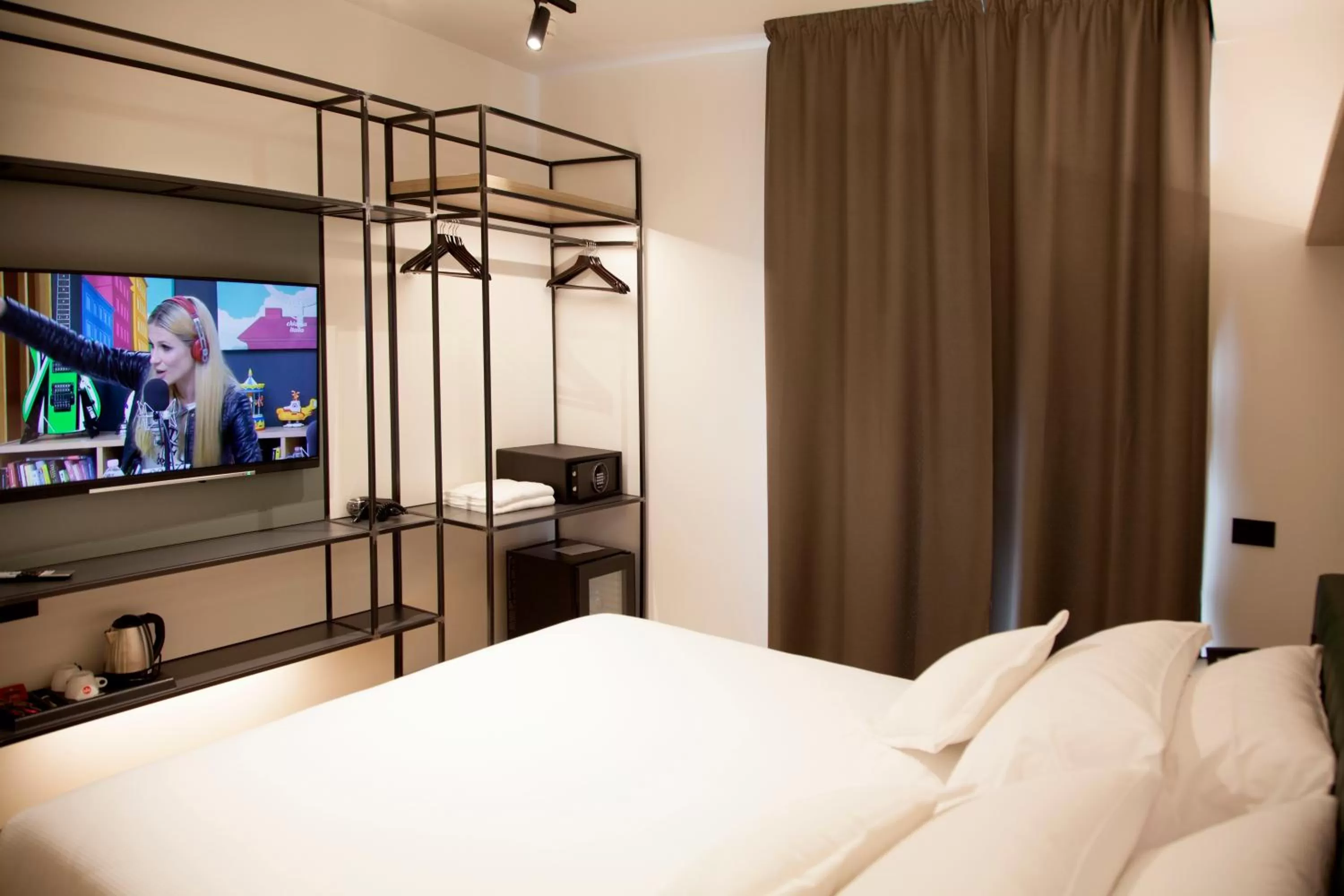 Bed in Meg Lifestyle Hotel & Apartaments