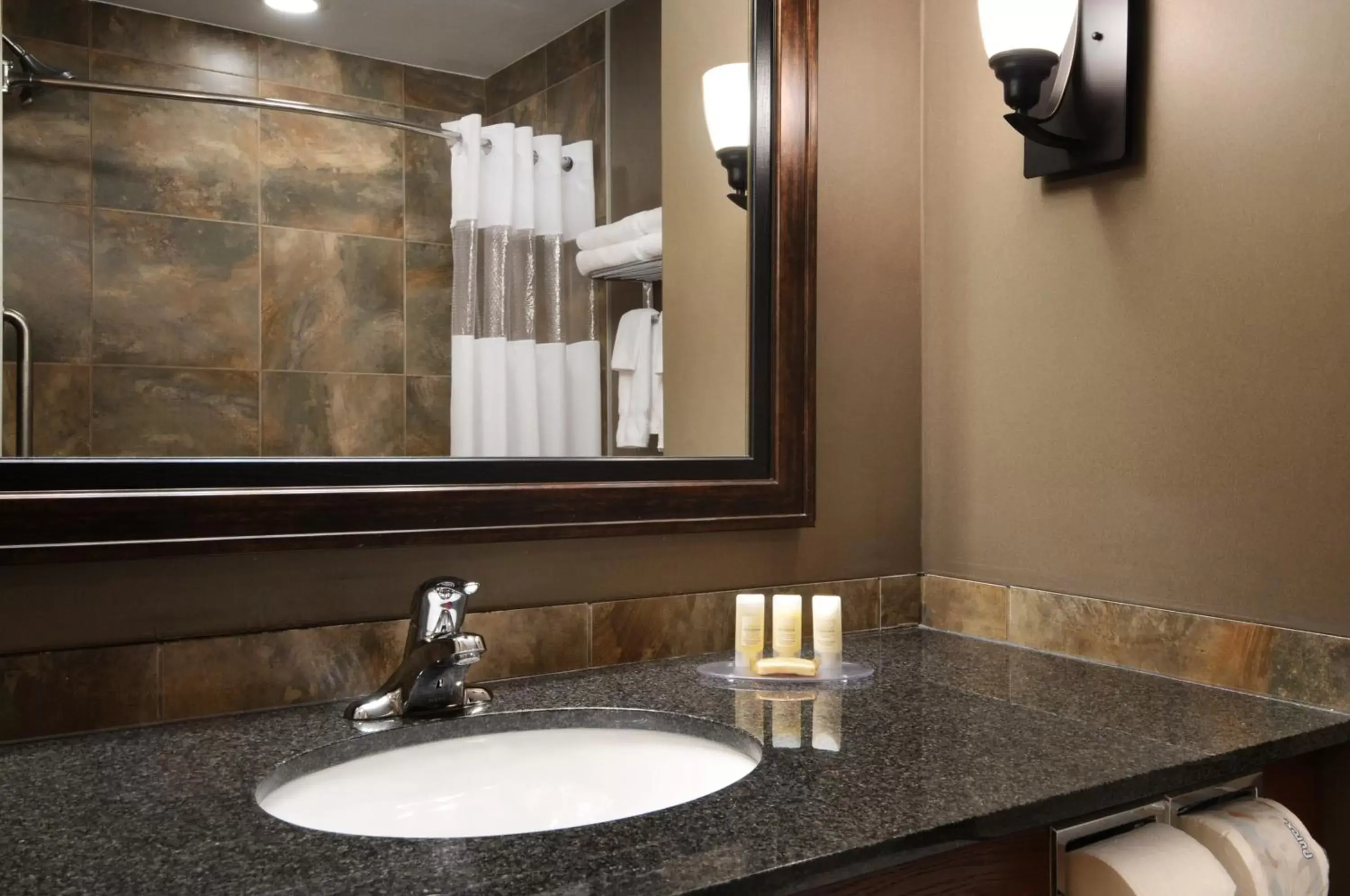 Bathroom in Days Inn & Suites by Wyndham Strathmore