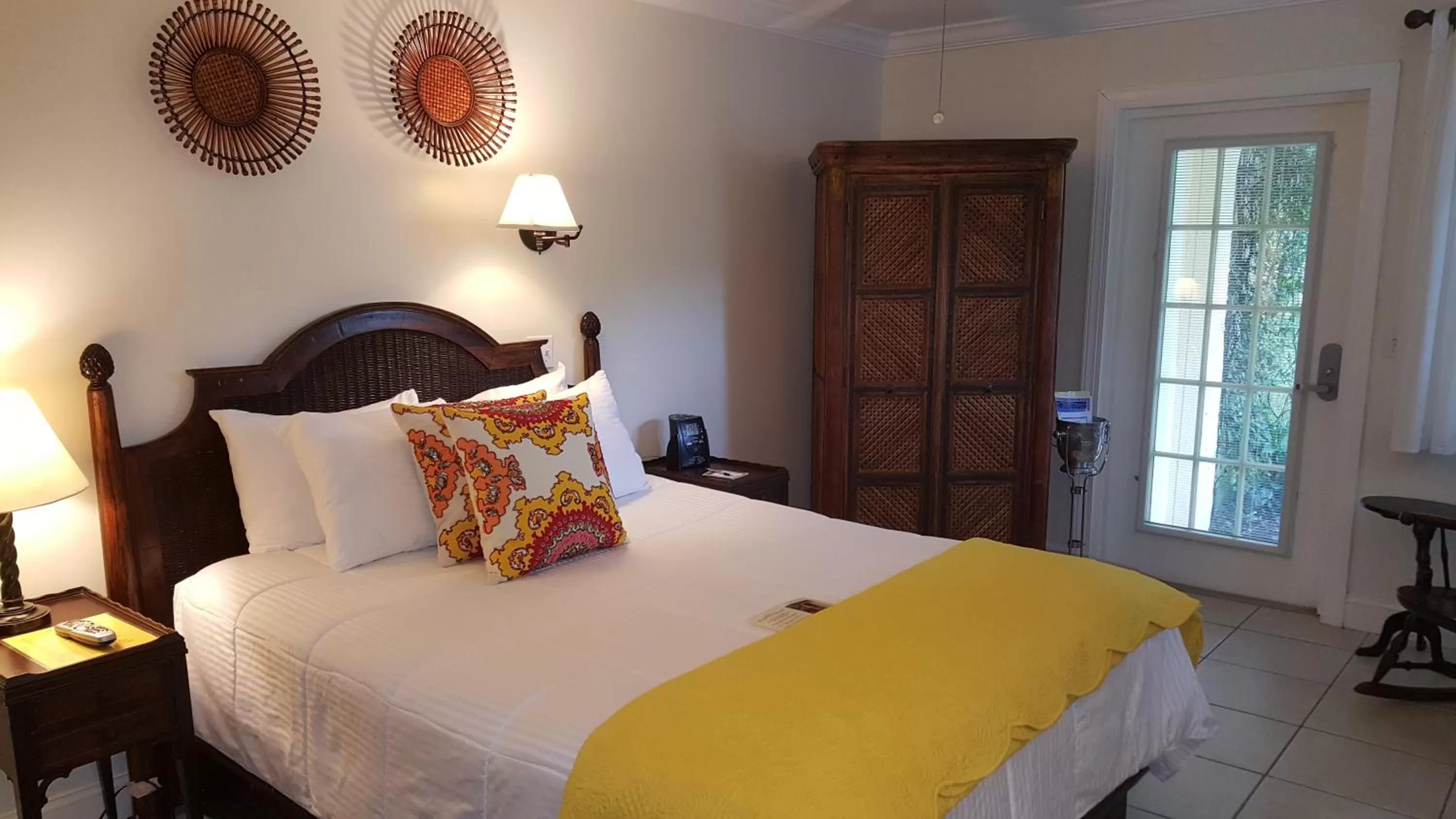Photo of the whole room, Bed in The Caribbean Court Boutique Hotel