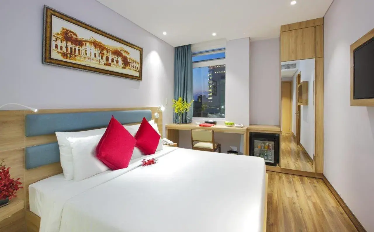 Bed in RAMADA ENCORE BY WYNDHAM SAIGON D1 - Formerly M Boutique Hotel Saigon