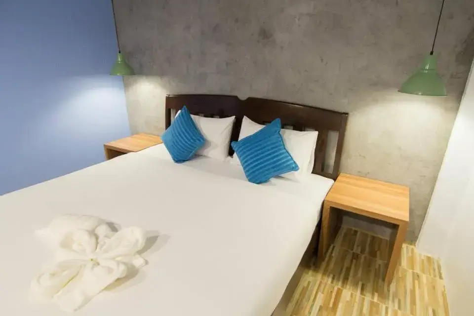 Bed in K.L. Boutique Hotel