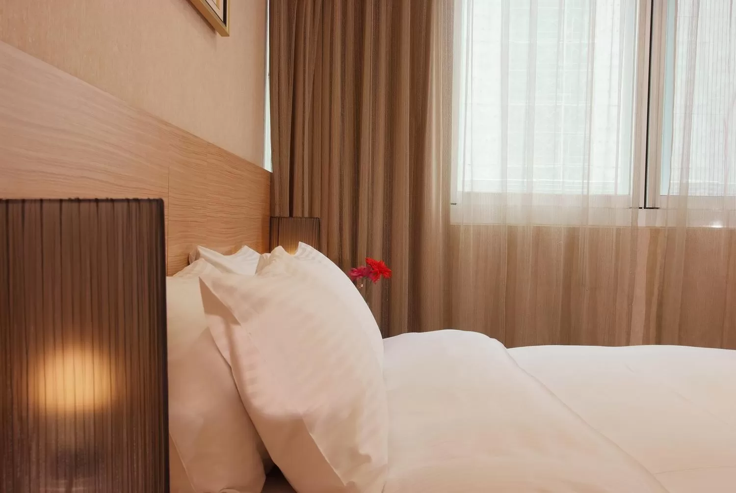 Bed in The Metro Hotel Taichung