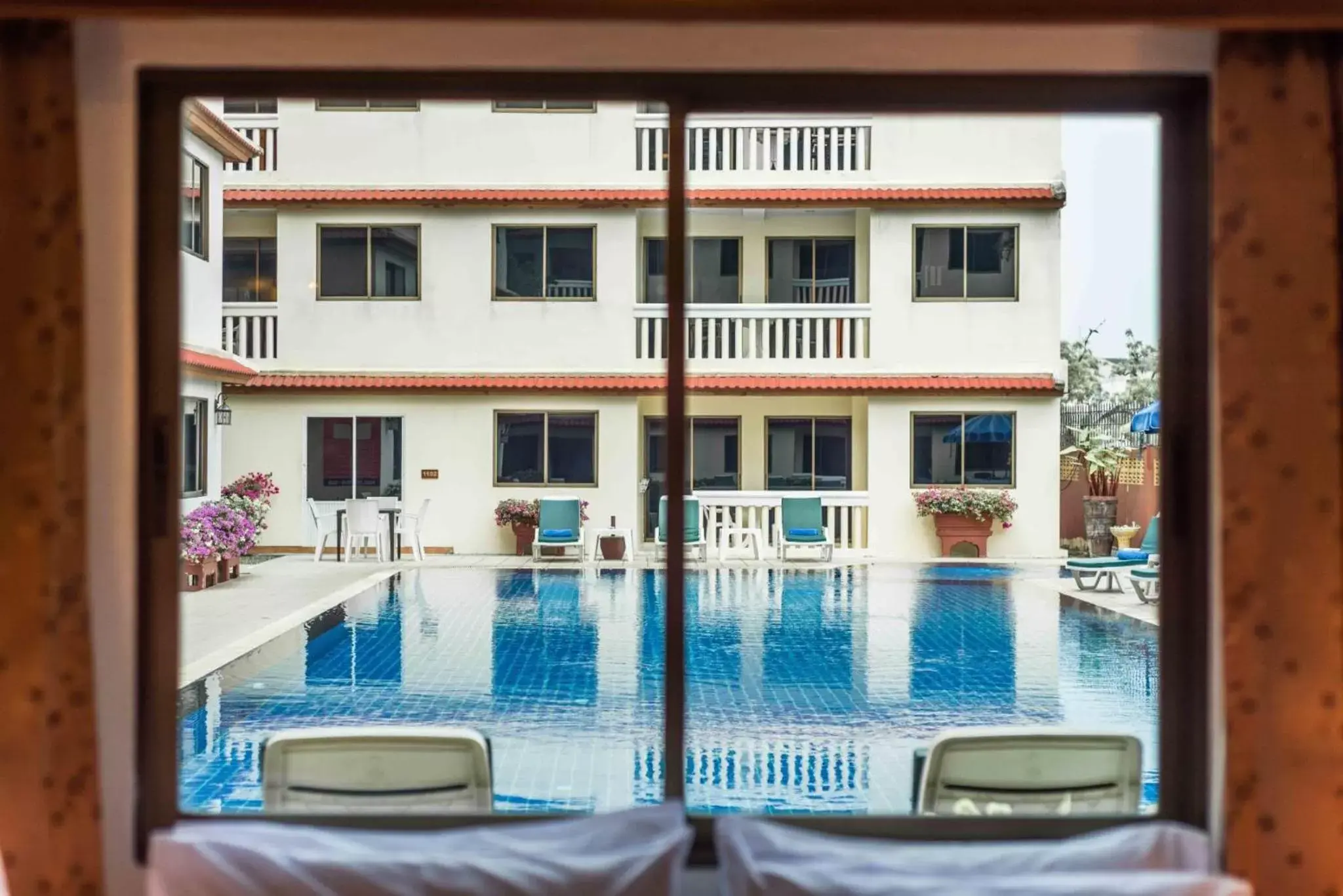 Pool view in The Residence Garden Pool view in The Residence Garden