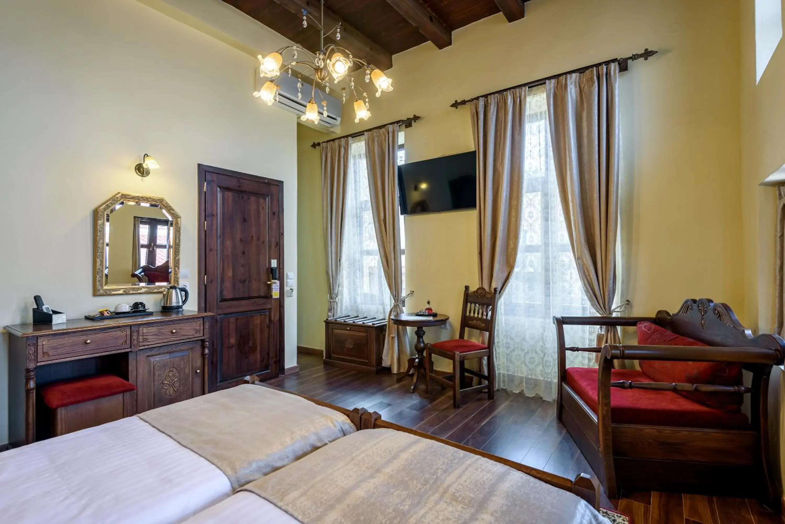 Seating area, Bed in Porto Del Colombo Traditional Boutique Hotel