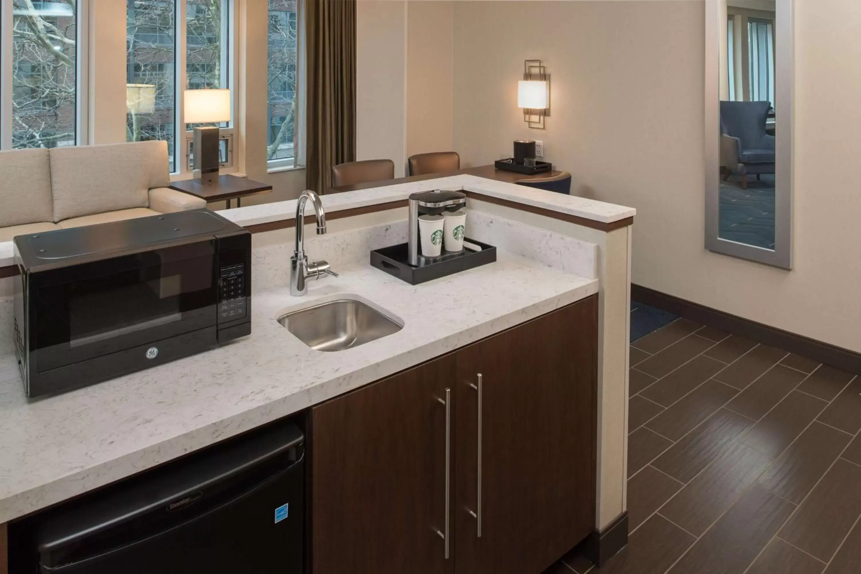 Photo of the whole room, Kitchen/Kitchenette in Embassy Suites By Hilton Seattle Downtown Pioneer Square