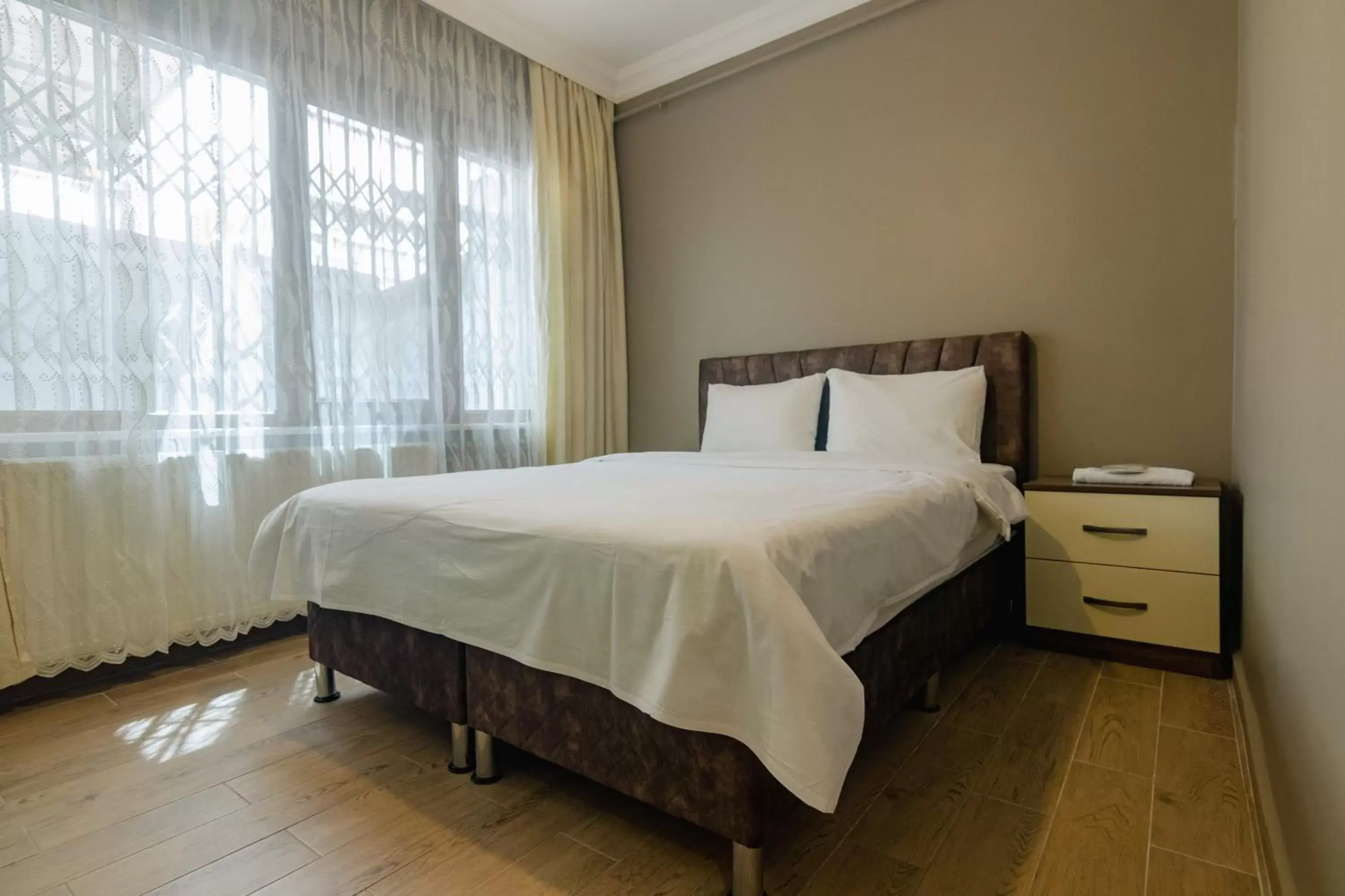 Bedroom, Bed in Zendy Suite Hotel