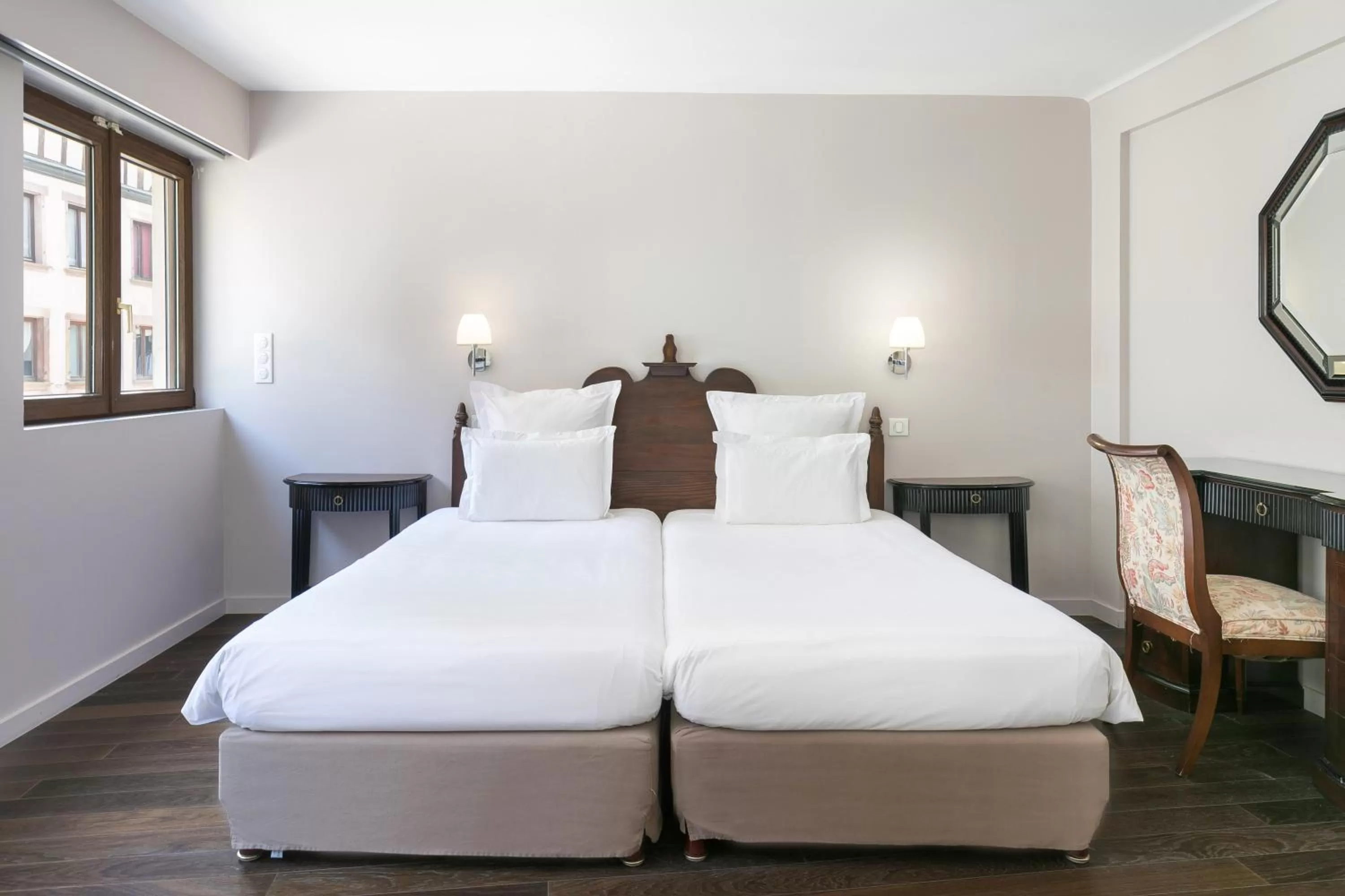 Bed in Hôtel de l'Europe by HappyCulture