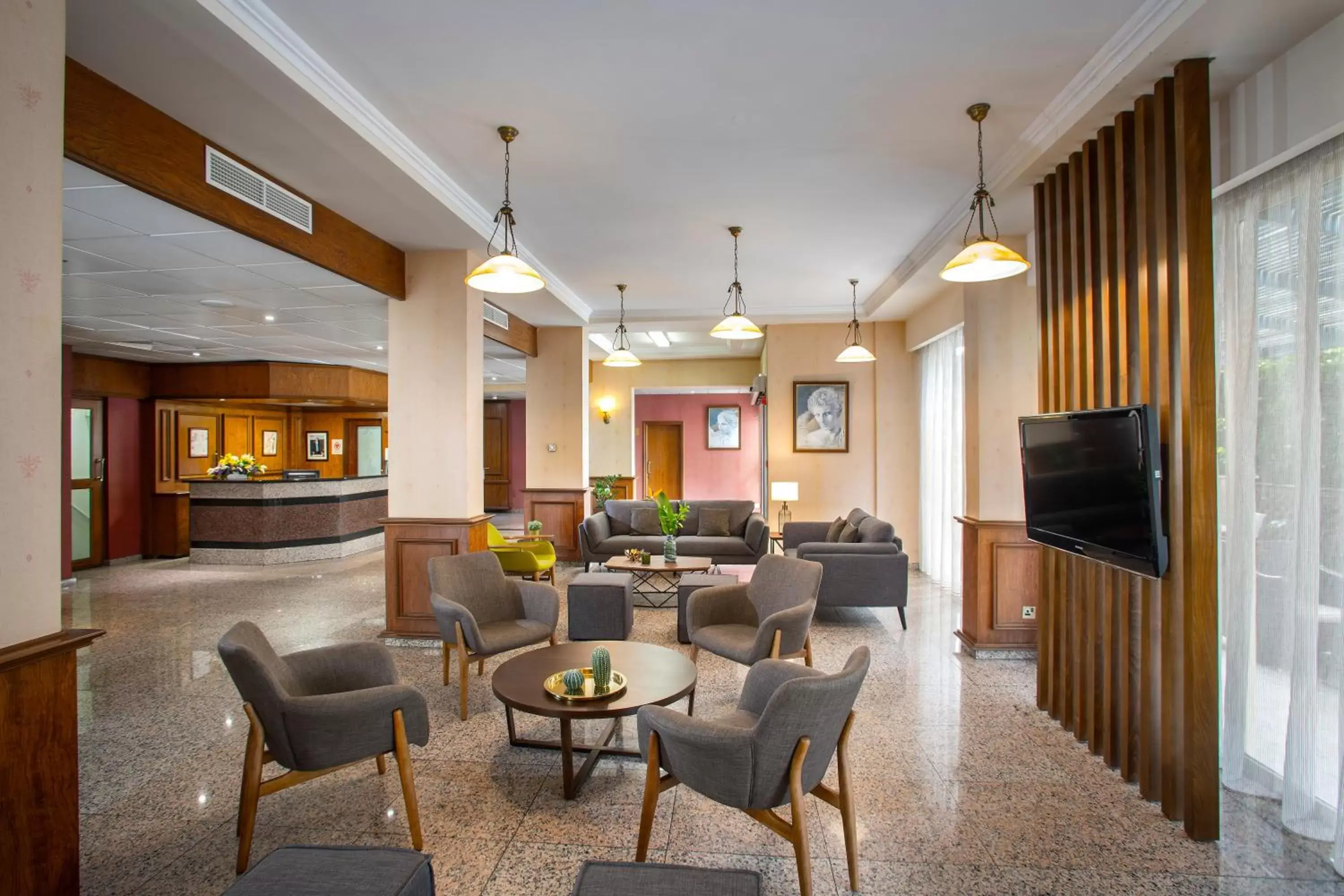 Lobby or reception in Kapetanios Limassol Hotel