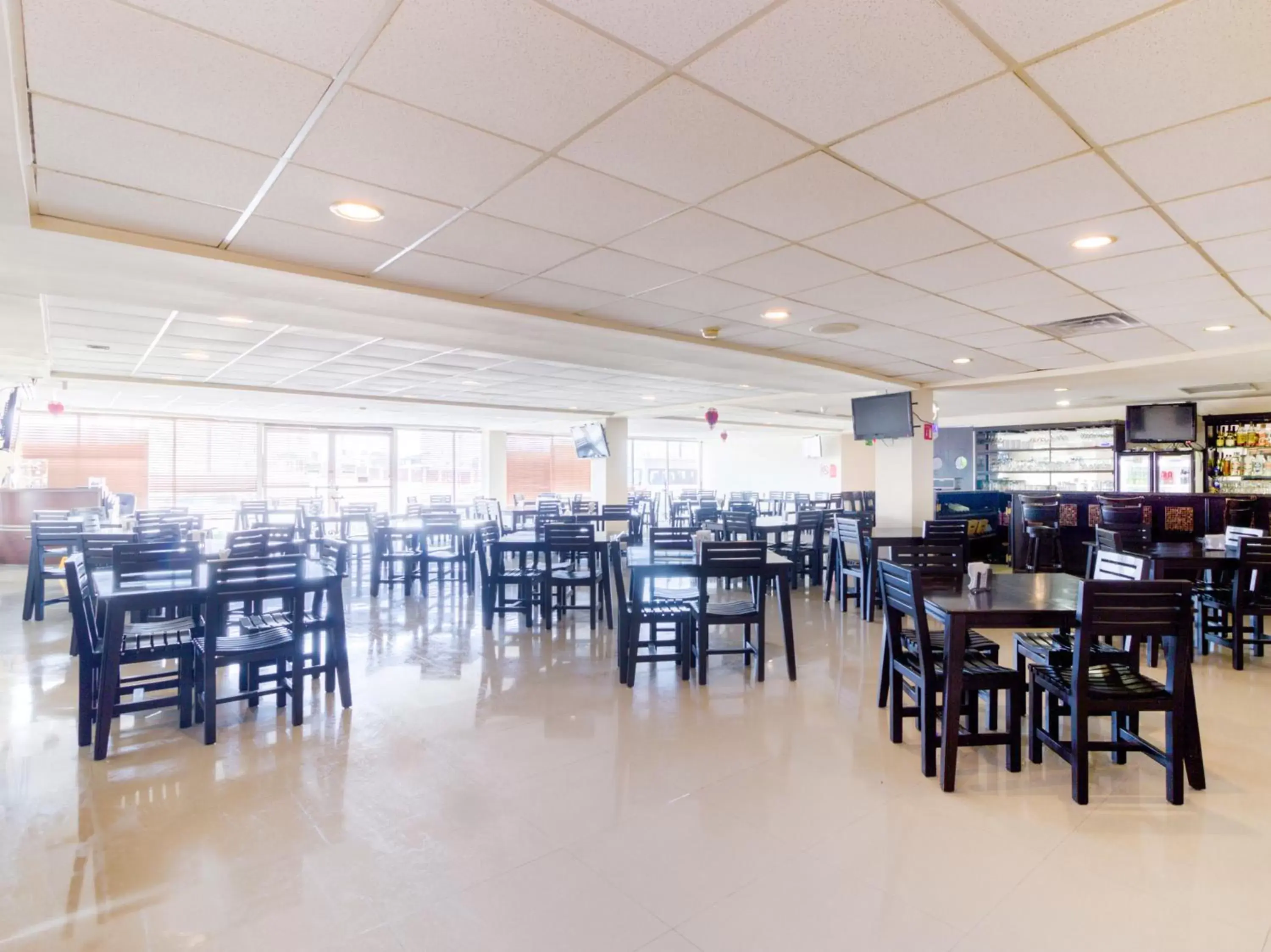 Restaurant/Places to Eat in Capital O Hotel Herederos, Piedras Negras