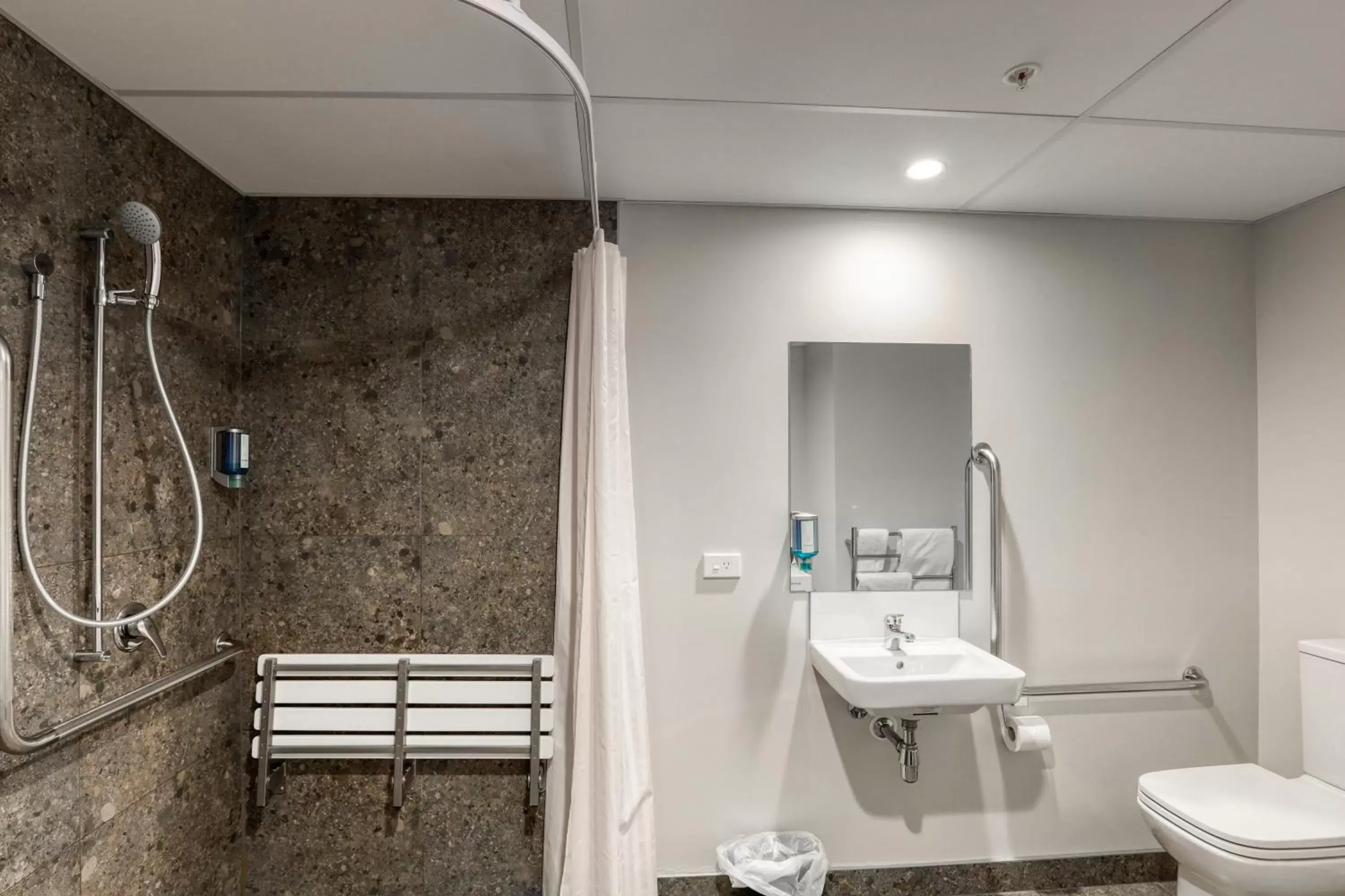 Bathroom in Ramada Suites by Wyndham Queenstown Remarkables Park