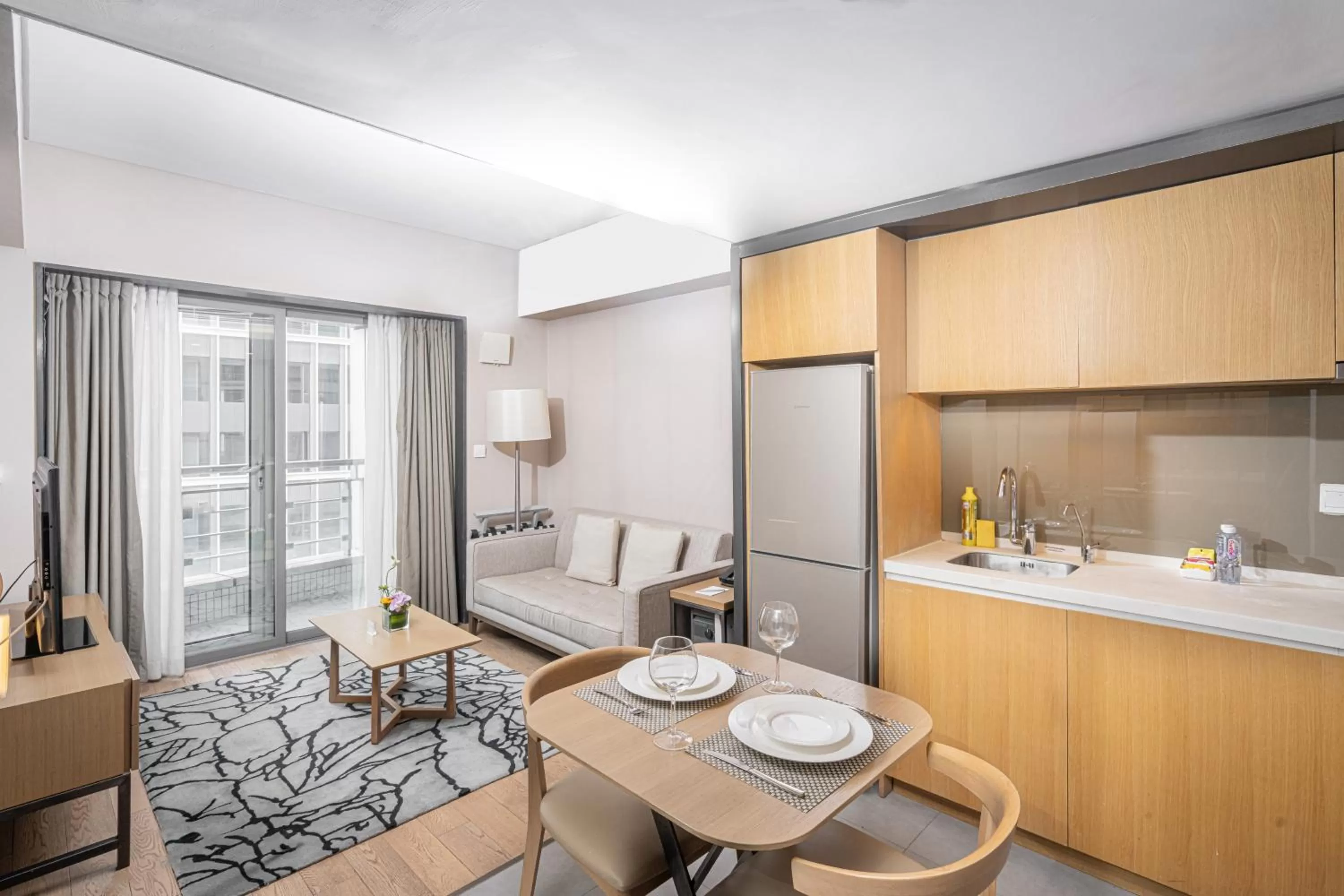 Living room, Kitchen/Kitchenette in Fraser Residence Shanghai