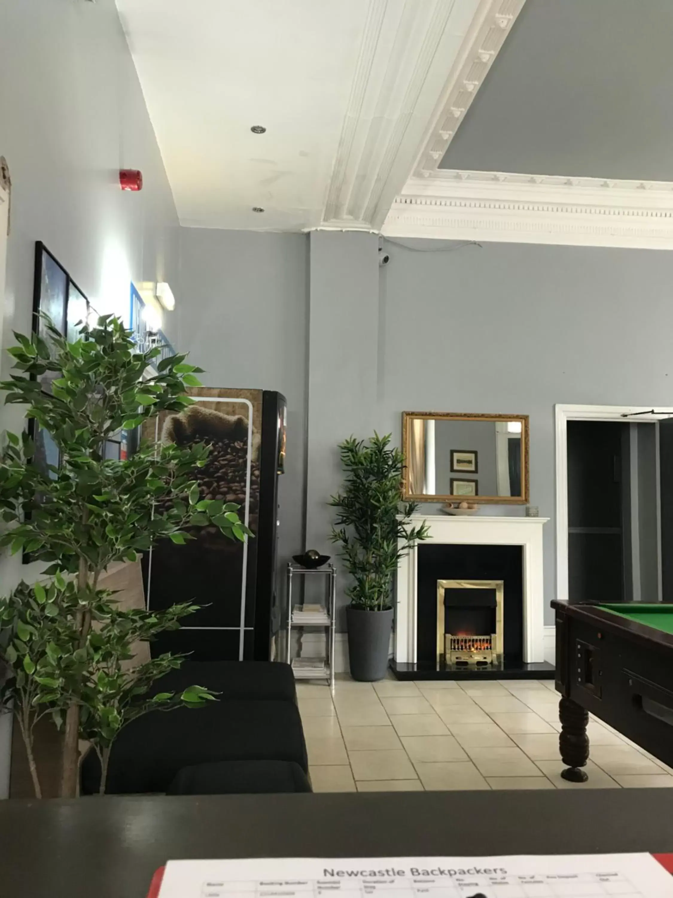 Communal lounge/ TV room in Newcastle West Hotel & Bar
