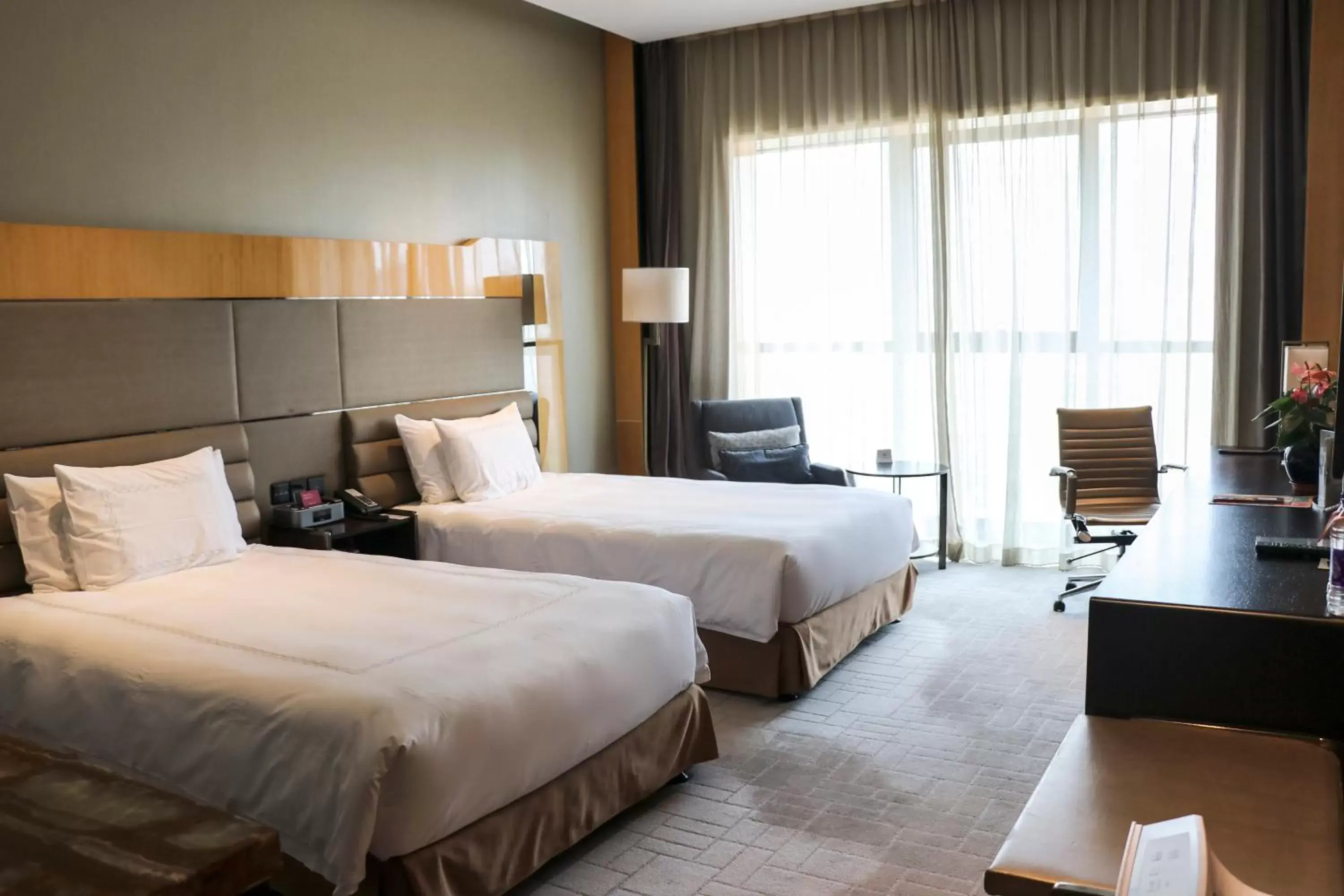 Bed in Crowne Plaza Beijing Lido by IHG Bed in Crowne Plaza Beijing Lido by IHG