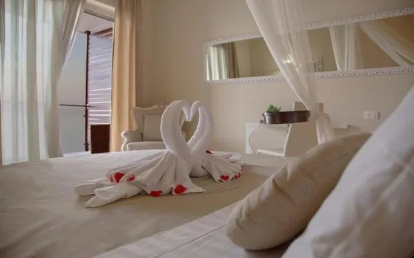 Bed in Main Palace Hotel