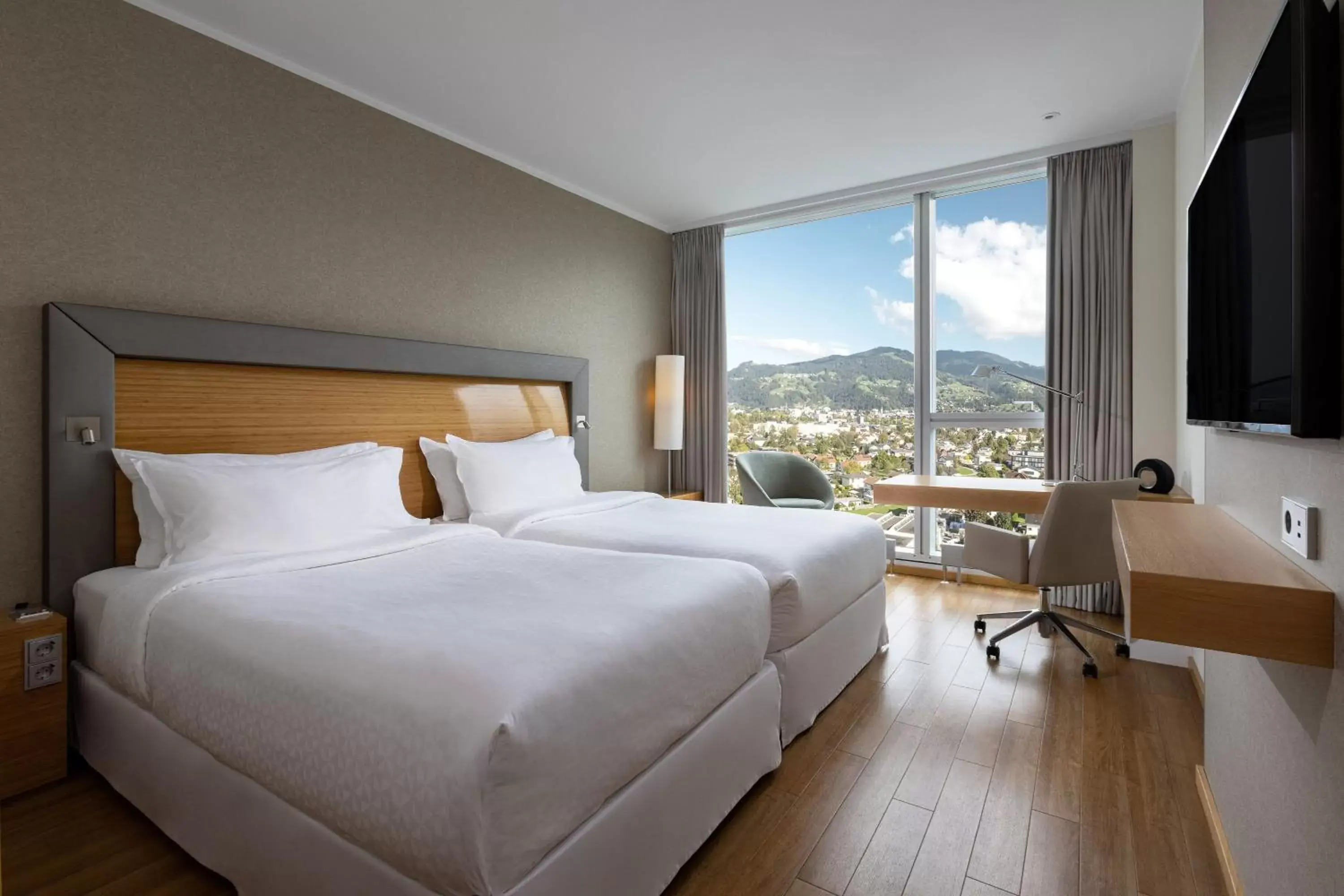 Photo of the whole room, Mountain View in Four Points by Sheraton Panoramahaus Dornbirn