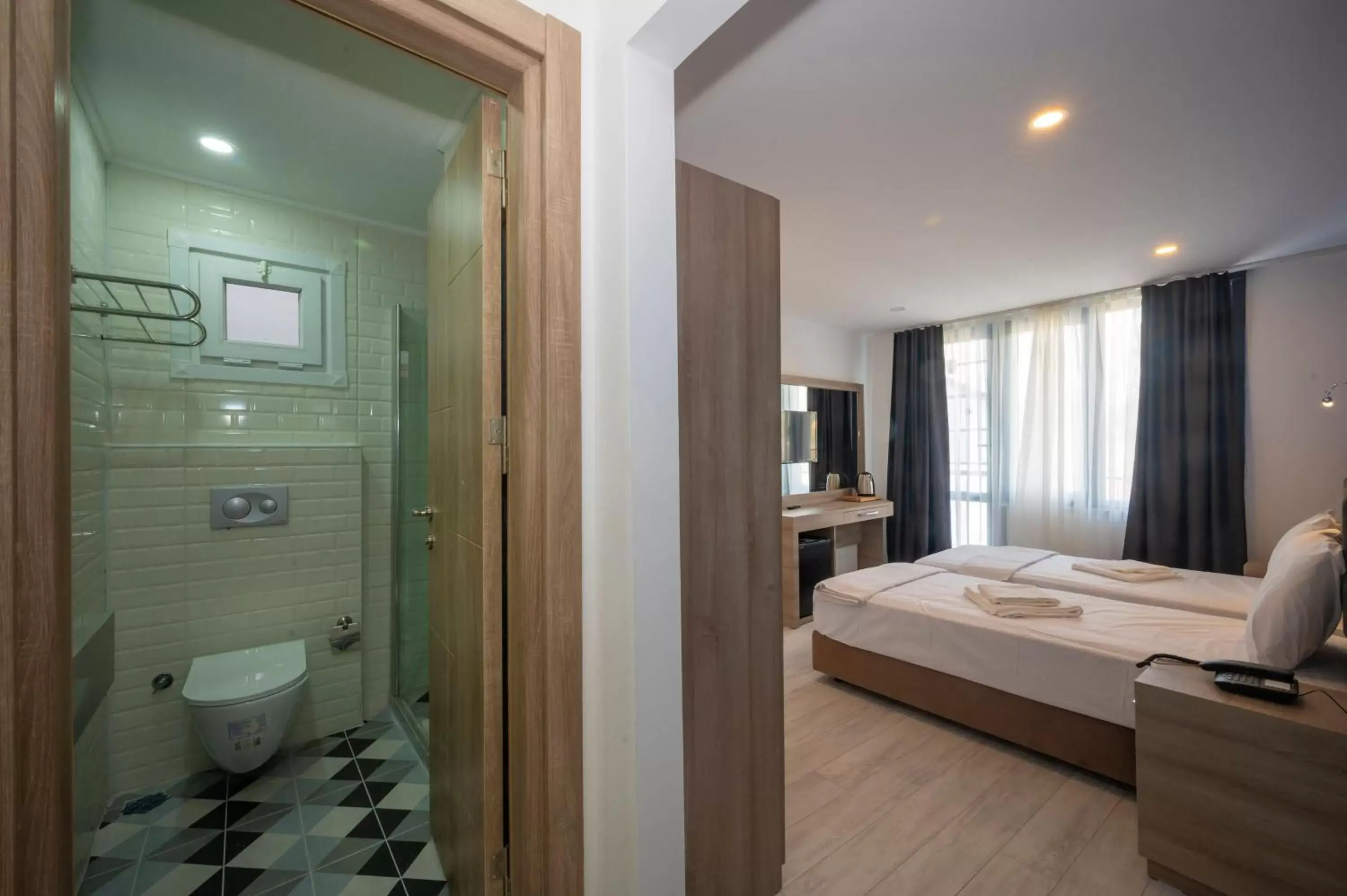 Bed, Bathroom in Okda Hotel