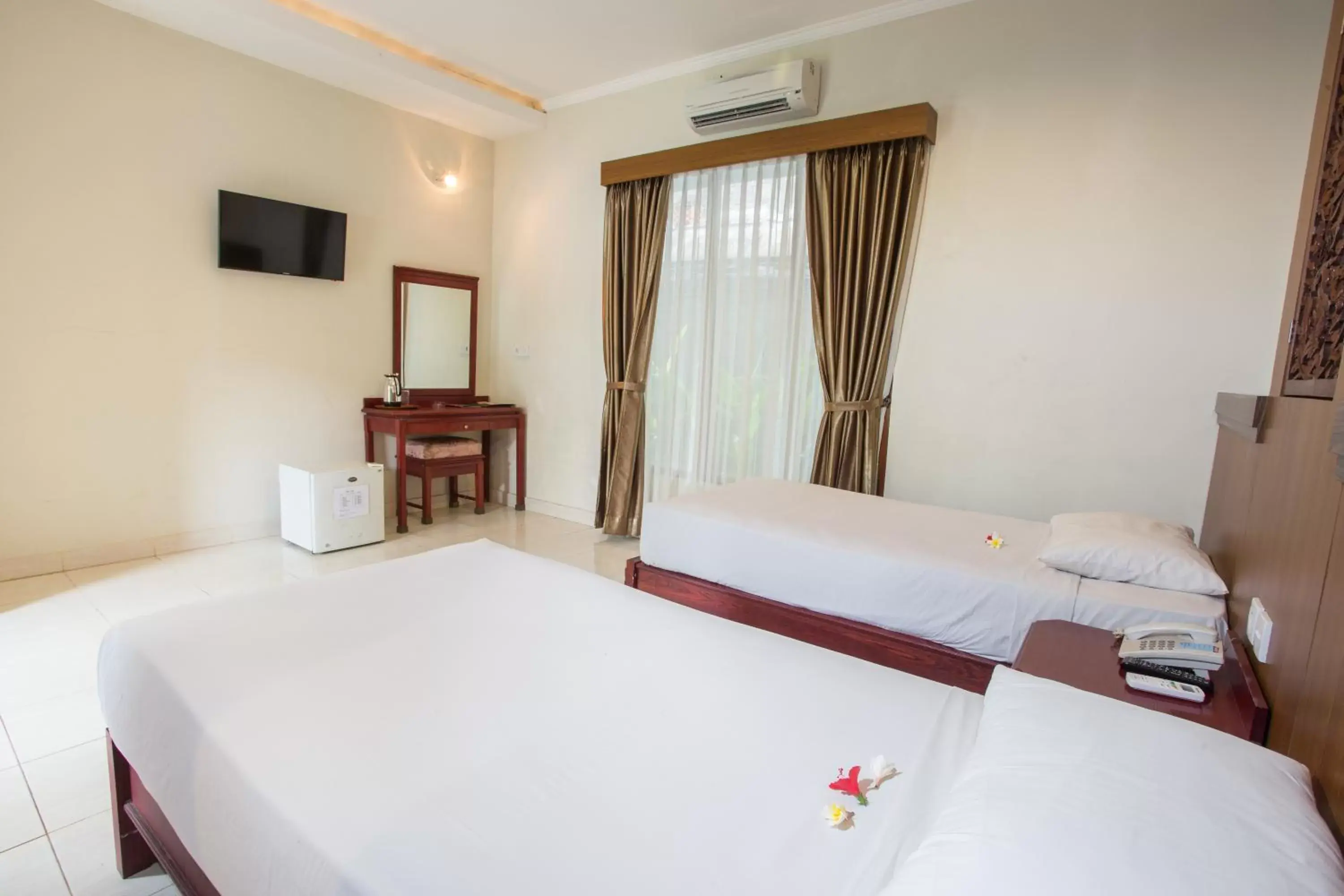 Bedroom, Bed in Sinar Bali Hotel