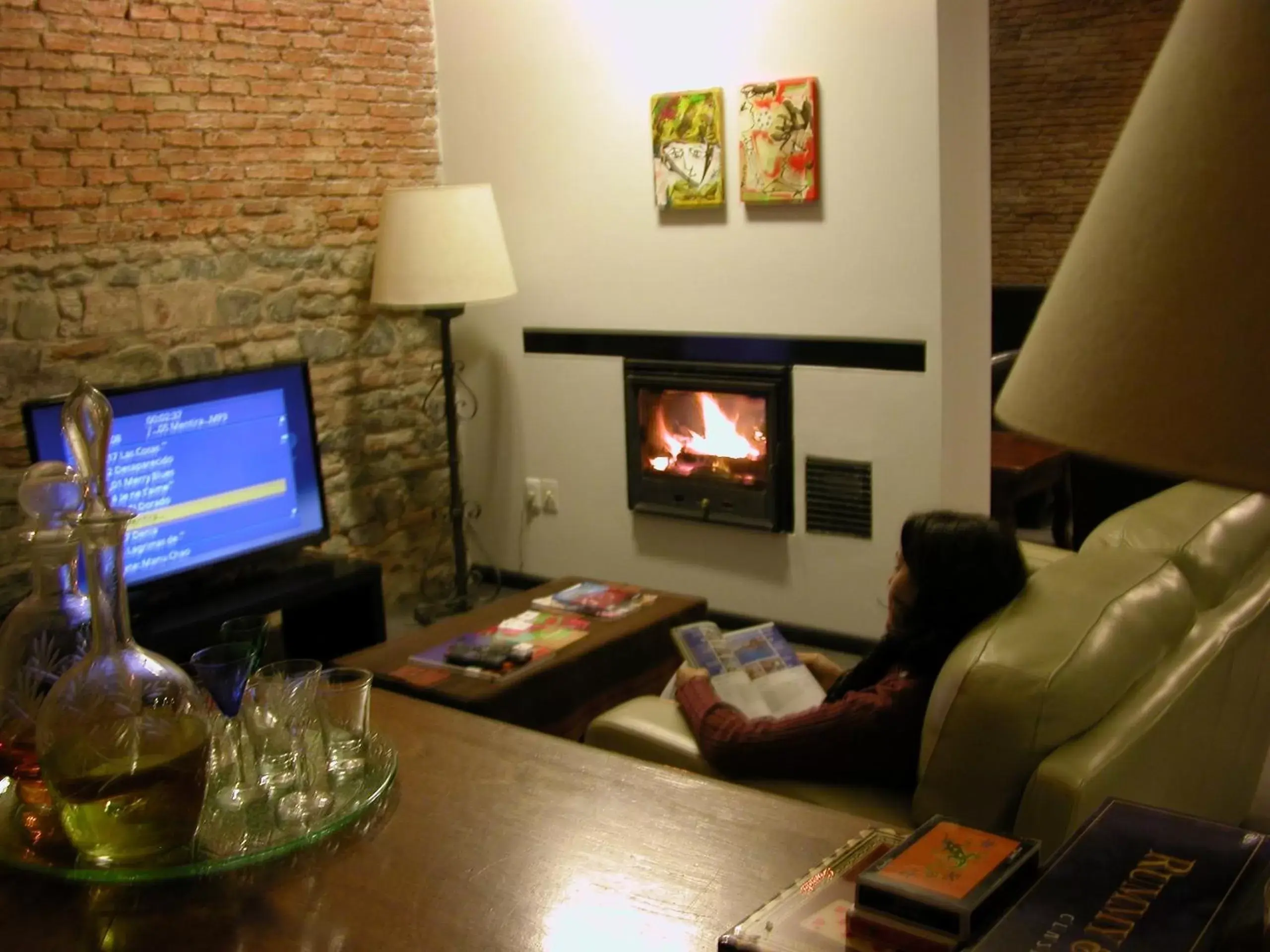 Communal lounge/ TV room, TV/Entertainment Center in Posada Boutique Las Terrazas