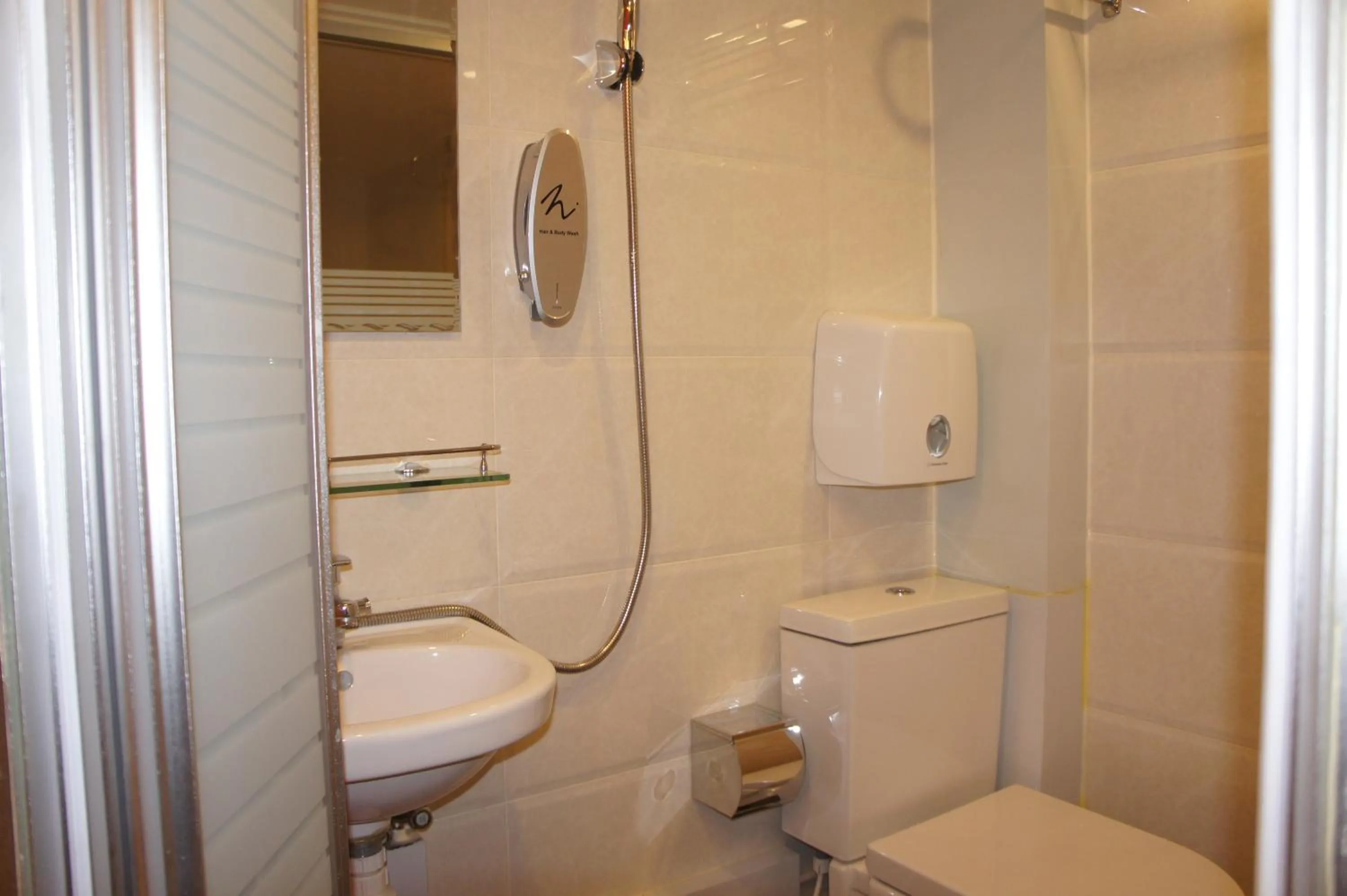 Toilet in Homy Inn North Point