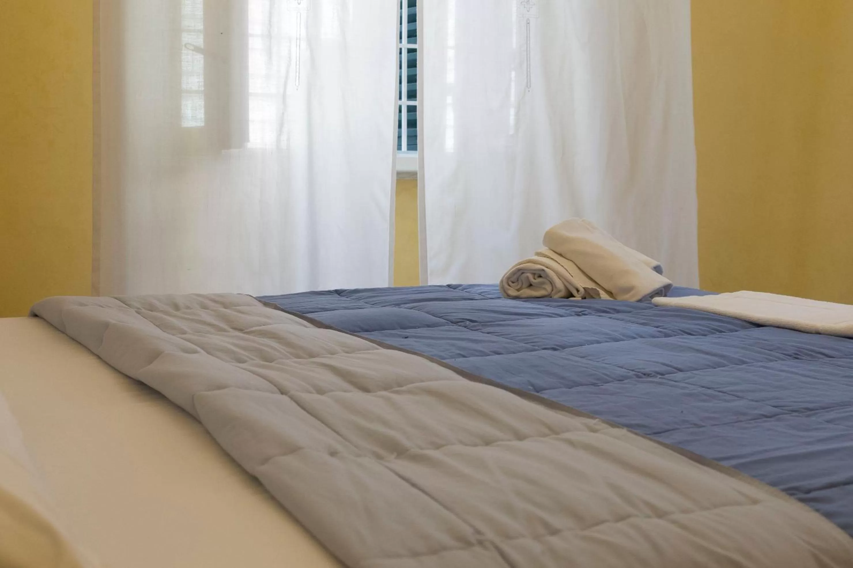 Photo of the whole room, Bed in La Breccia A Porta Pia