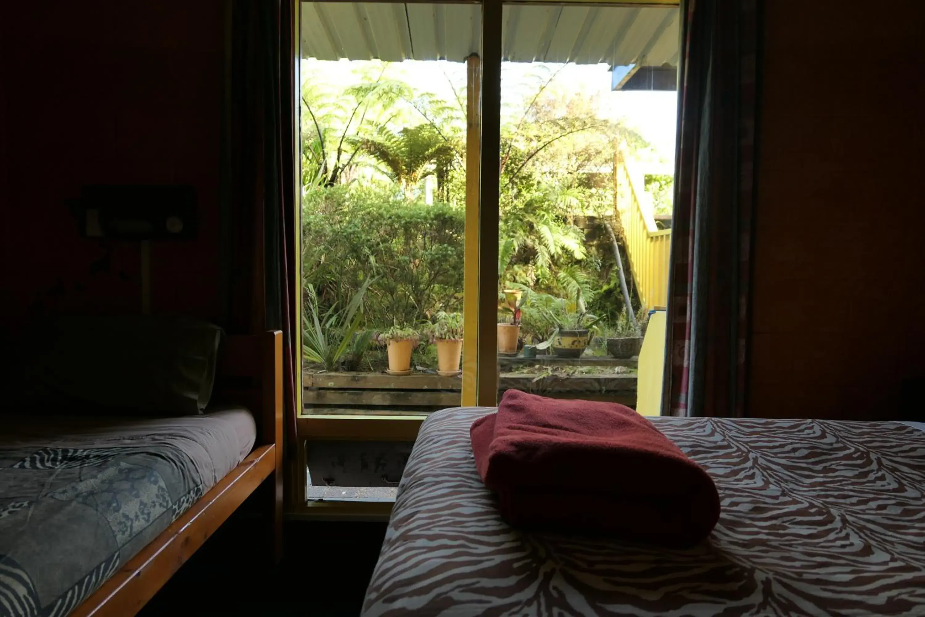 Bedroom, Bed in Global Village Travellers Lodge