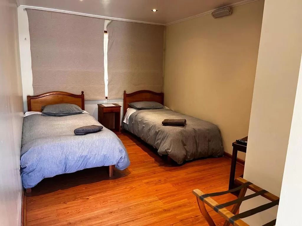 Bed in Hotel y Cabañas Villarrica