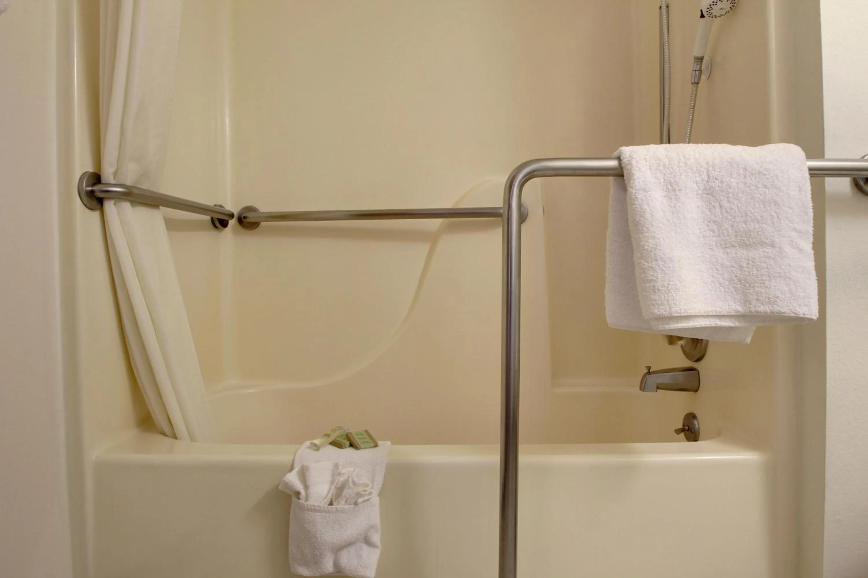 Bathroom in Super 8 by Wyndham Manhattan KS