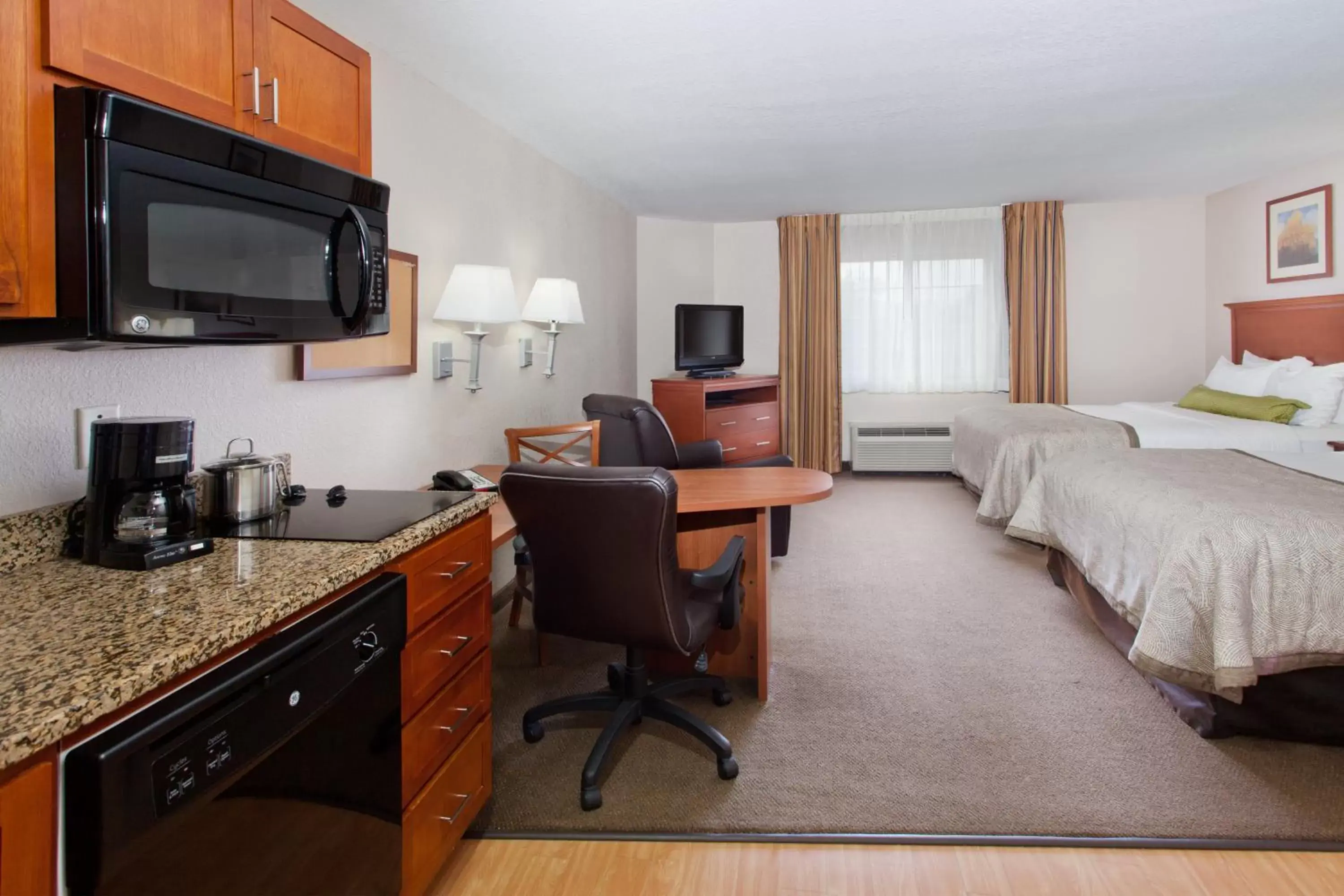 Photo of the whole room, TV/Entertainment Center in Candlewood Suites Lexington, an IHG Hotel