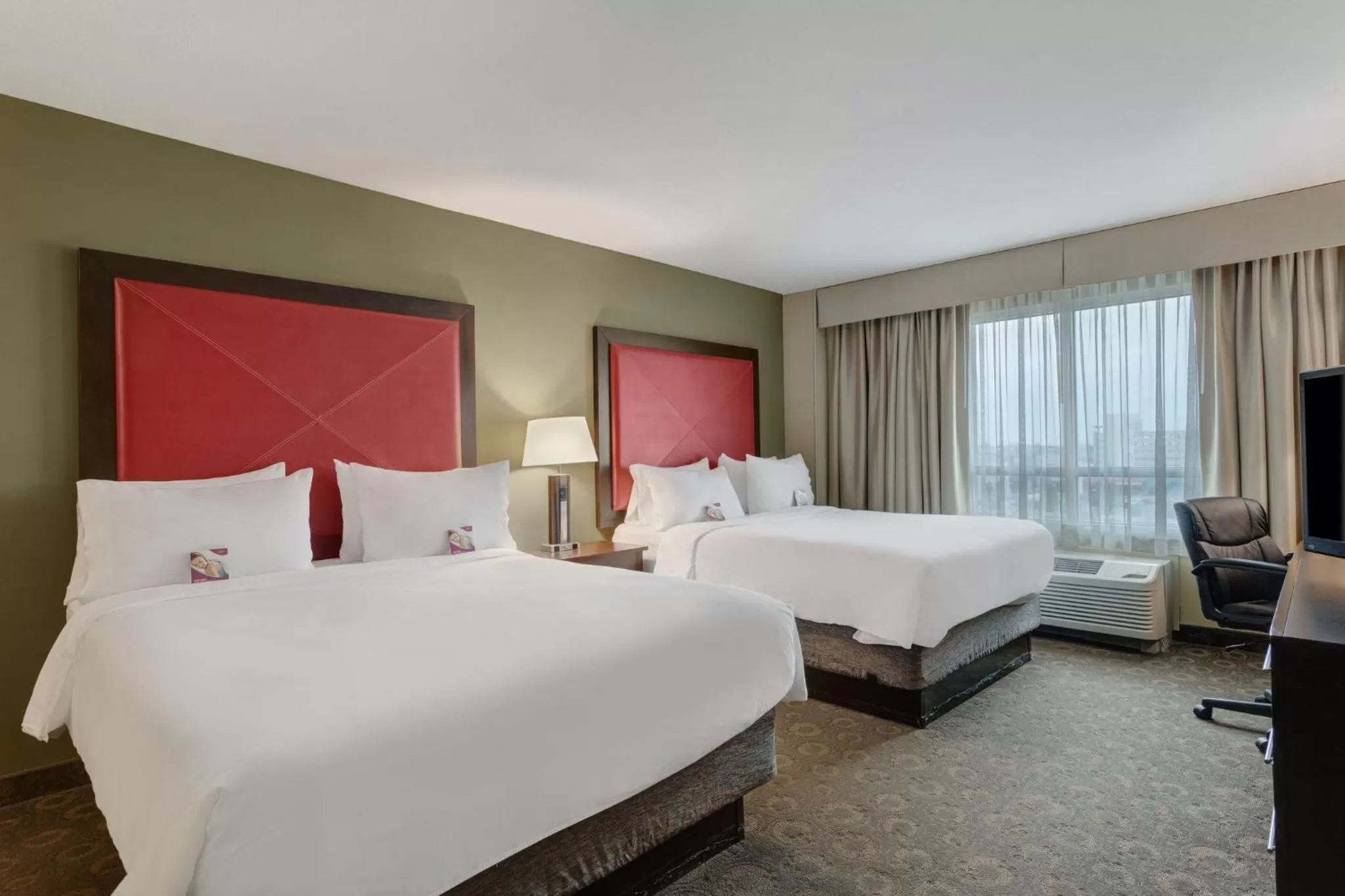 Photo of the whole room, Bed in Crowne Plaza Houston Galleria Area by IHG