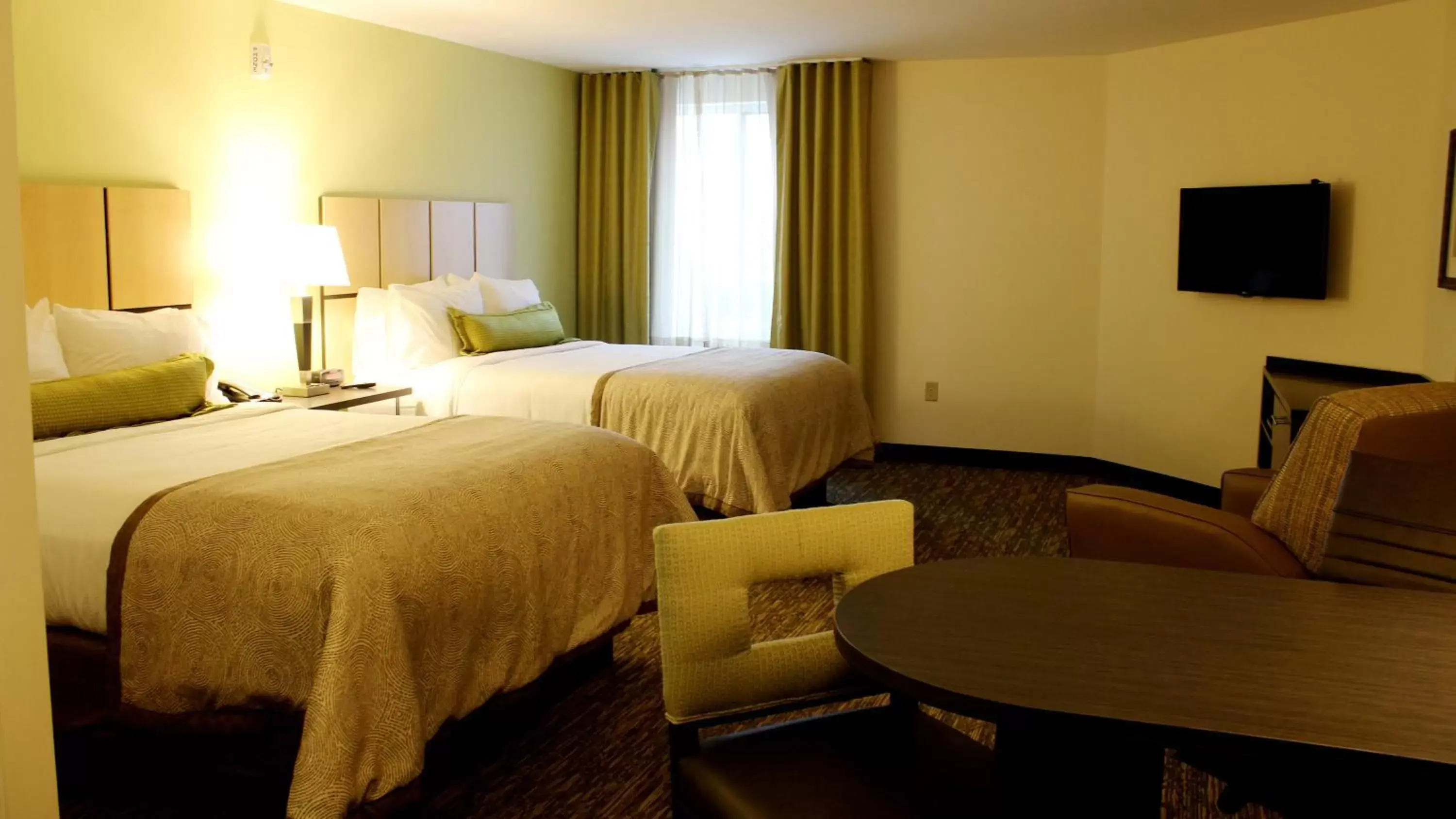 Photo of the whole room, Bed in Candlewood Suites Sioux City - Southern Hills, an IHG Hotel