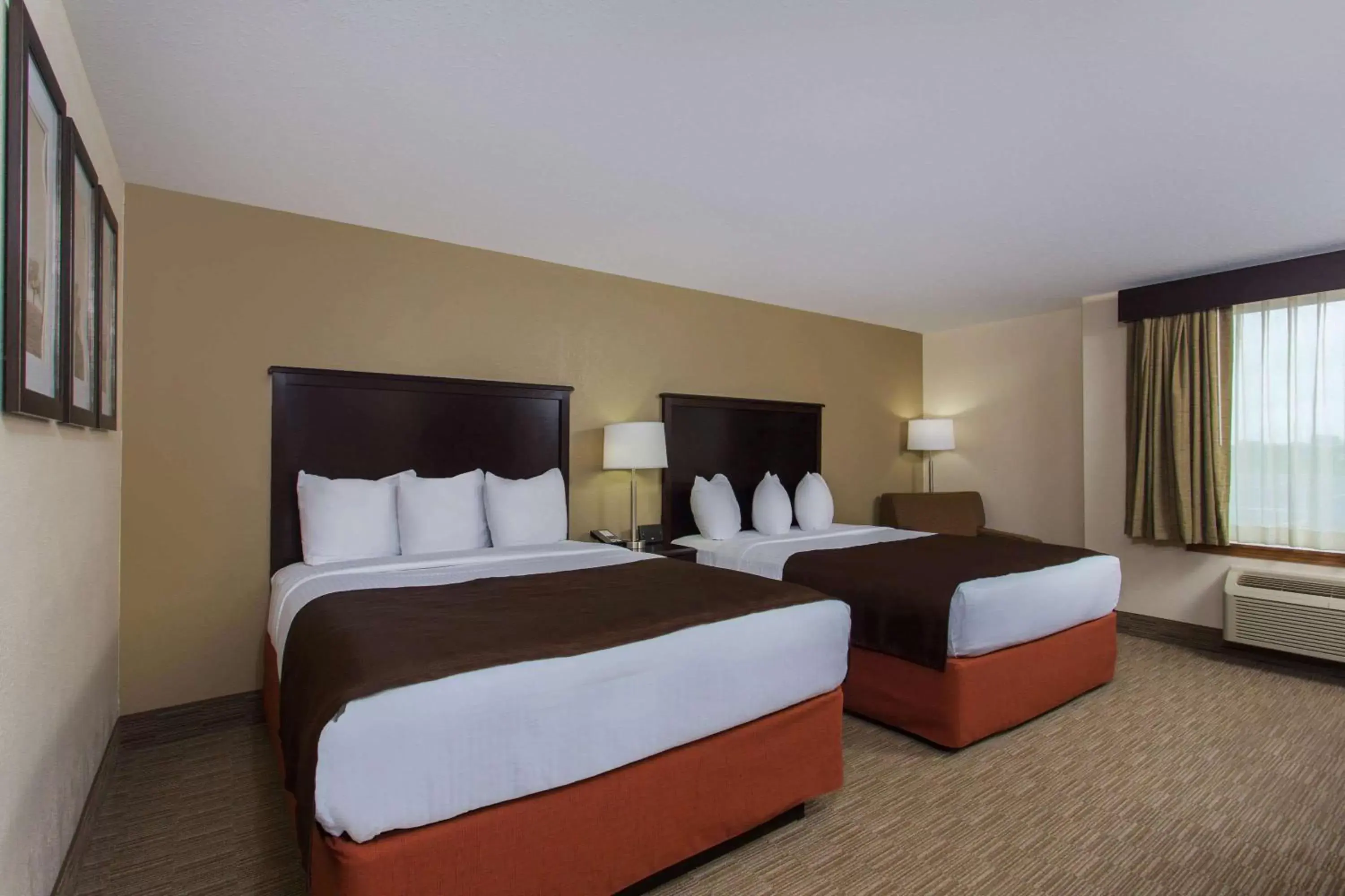 Photo of the whole room, Bed in AmericInn by Wyndham Janesville