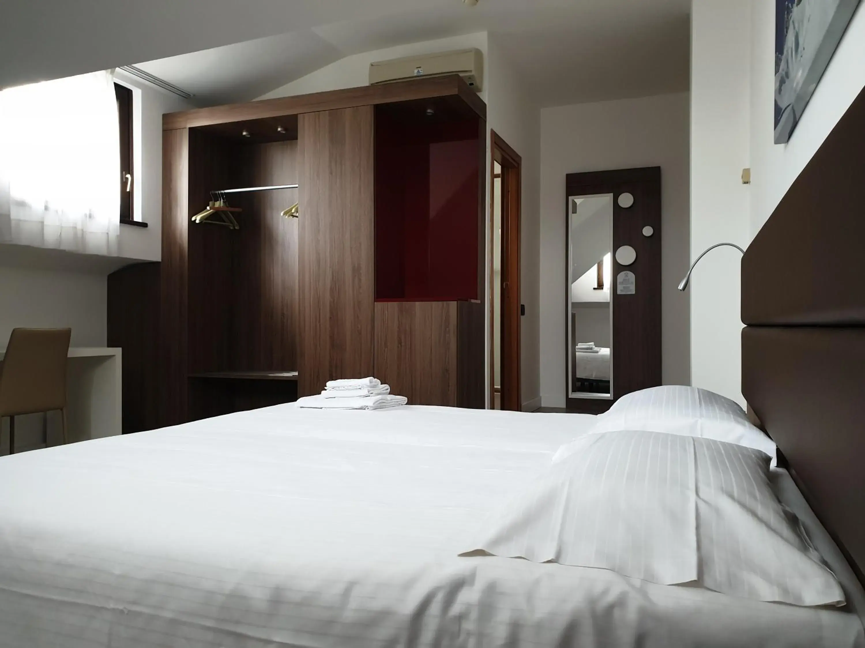 Bed in Albergo Delle Alpi Bed in Albergo Delle Alpi
