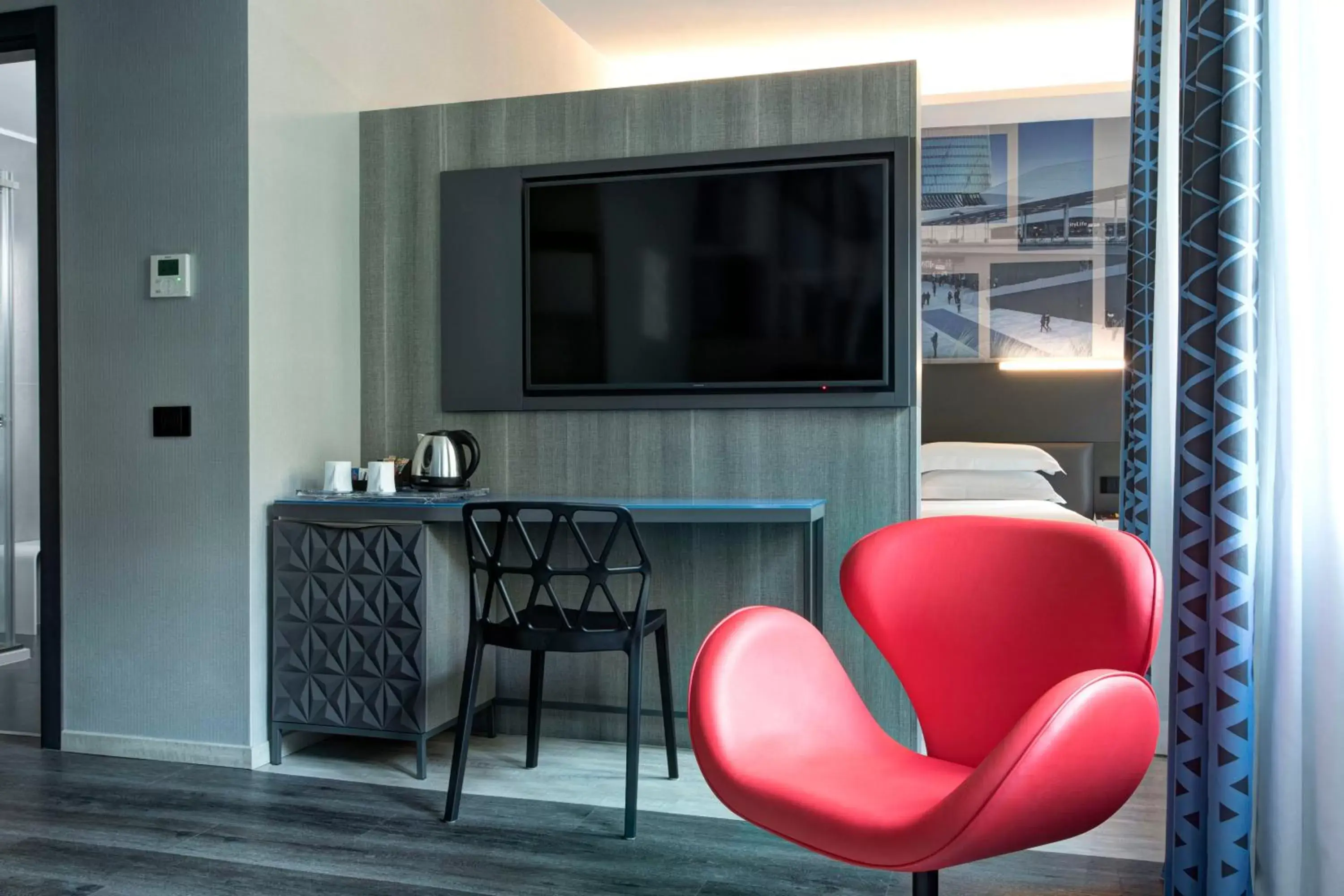 TV and multimedia, TV/Entertainment Center in iQ Hotel Milano