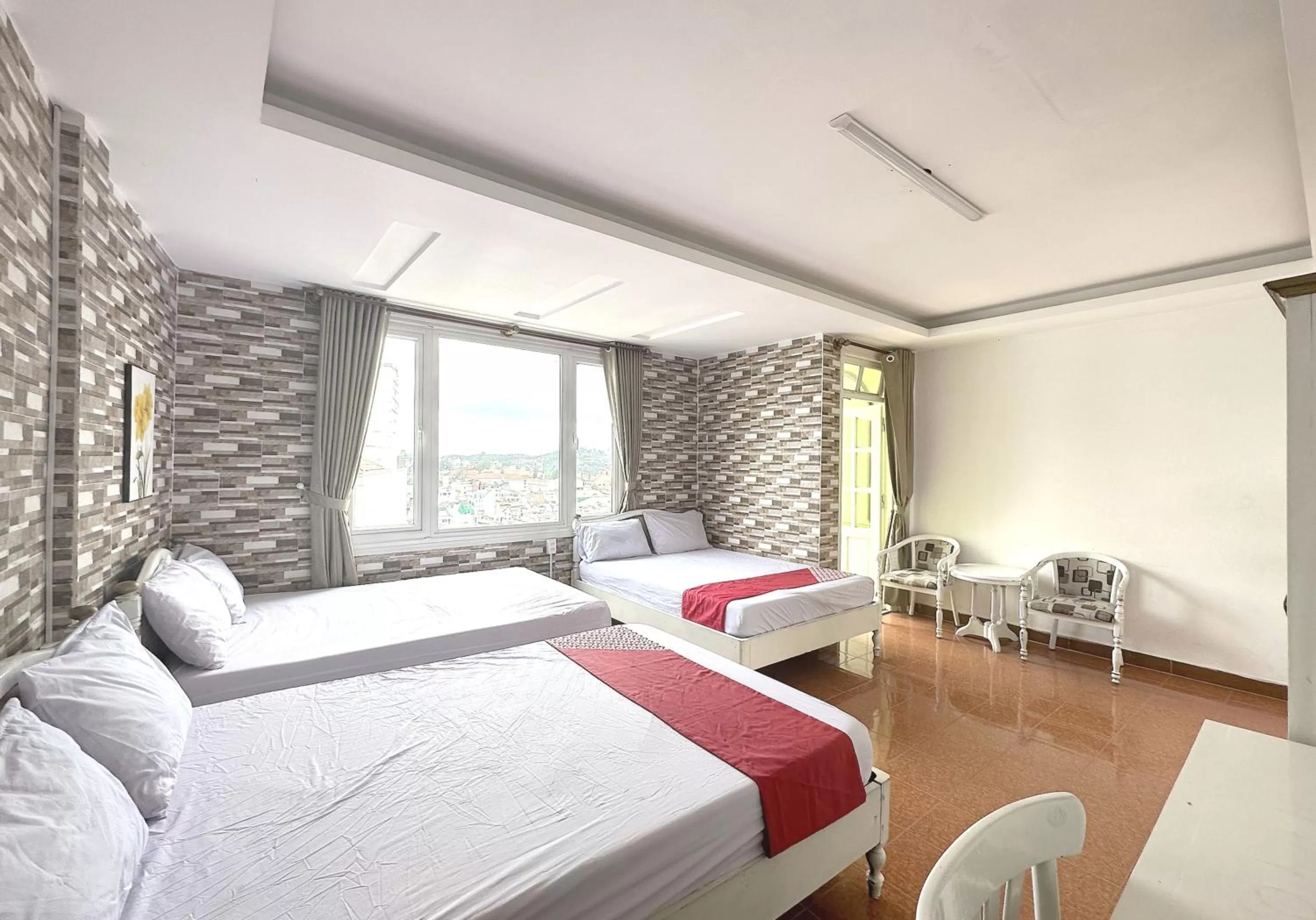 Photo of the whole room in OYO 1196 Le Vu Hotel