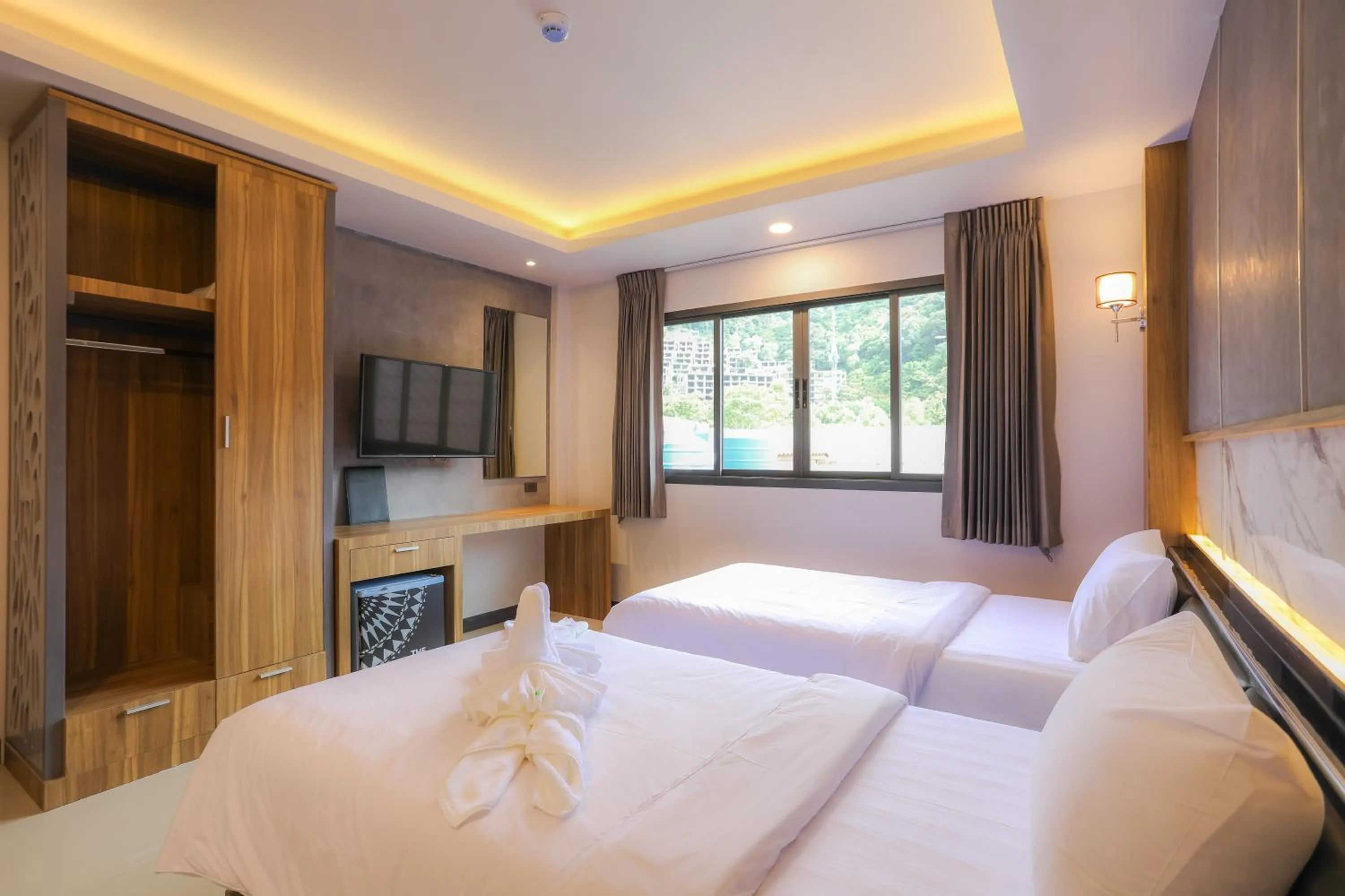 Photo of the whole room, Bed in The Mantra Hotel Kata Noi