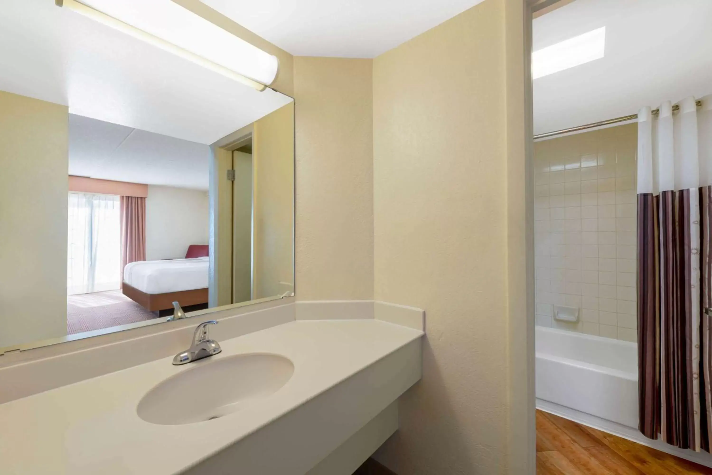 Bathroom in La Quinta Inn by Wyndham Deerfield Beach I-95 at Hillsboro E