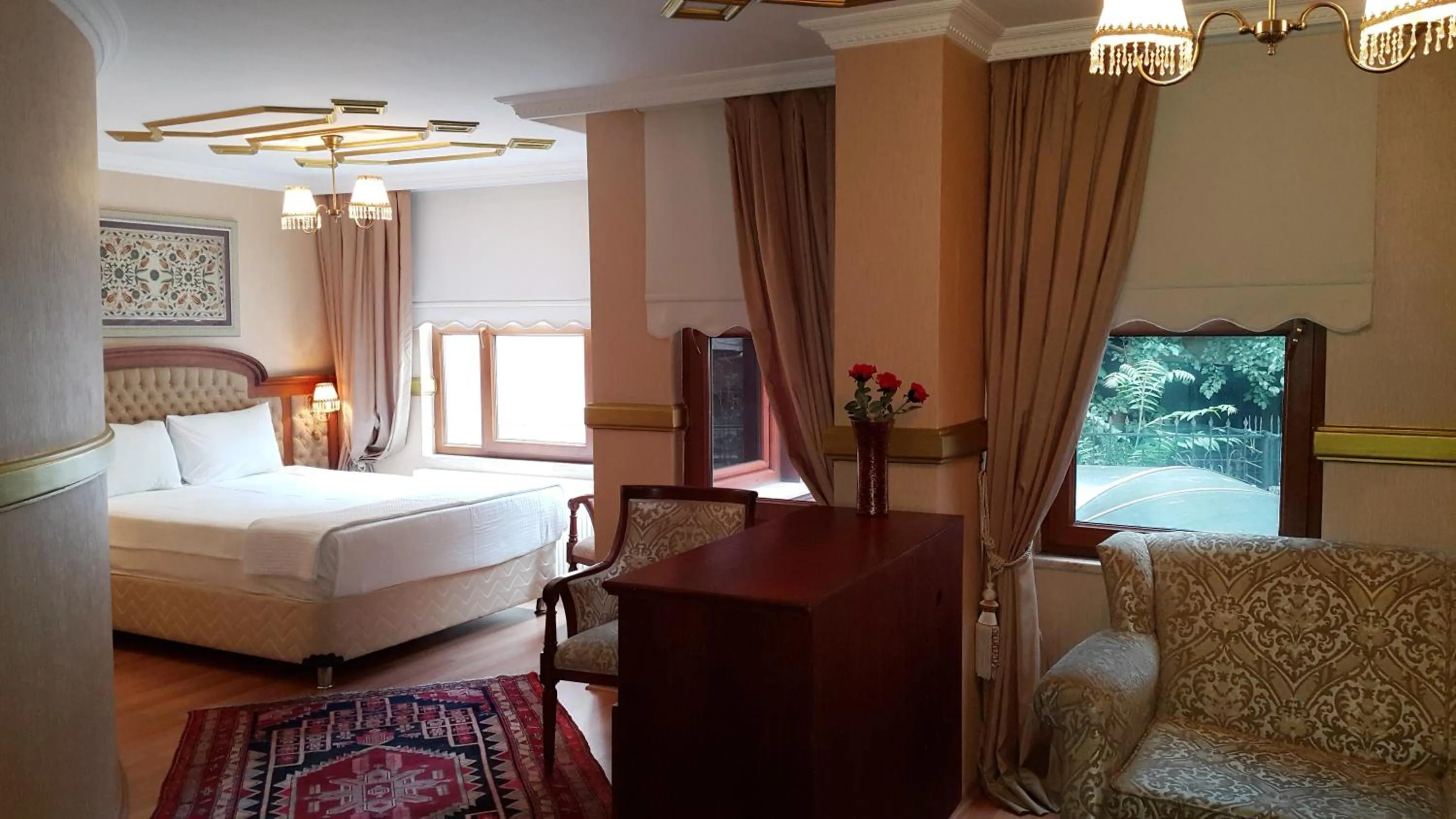 Bed in Aruna Boutique Hotel