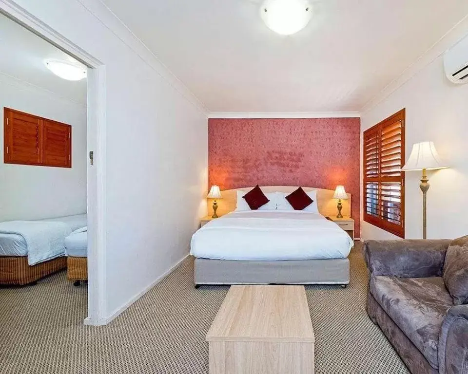 Bed in Country Plaza Motel Taree