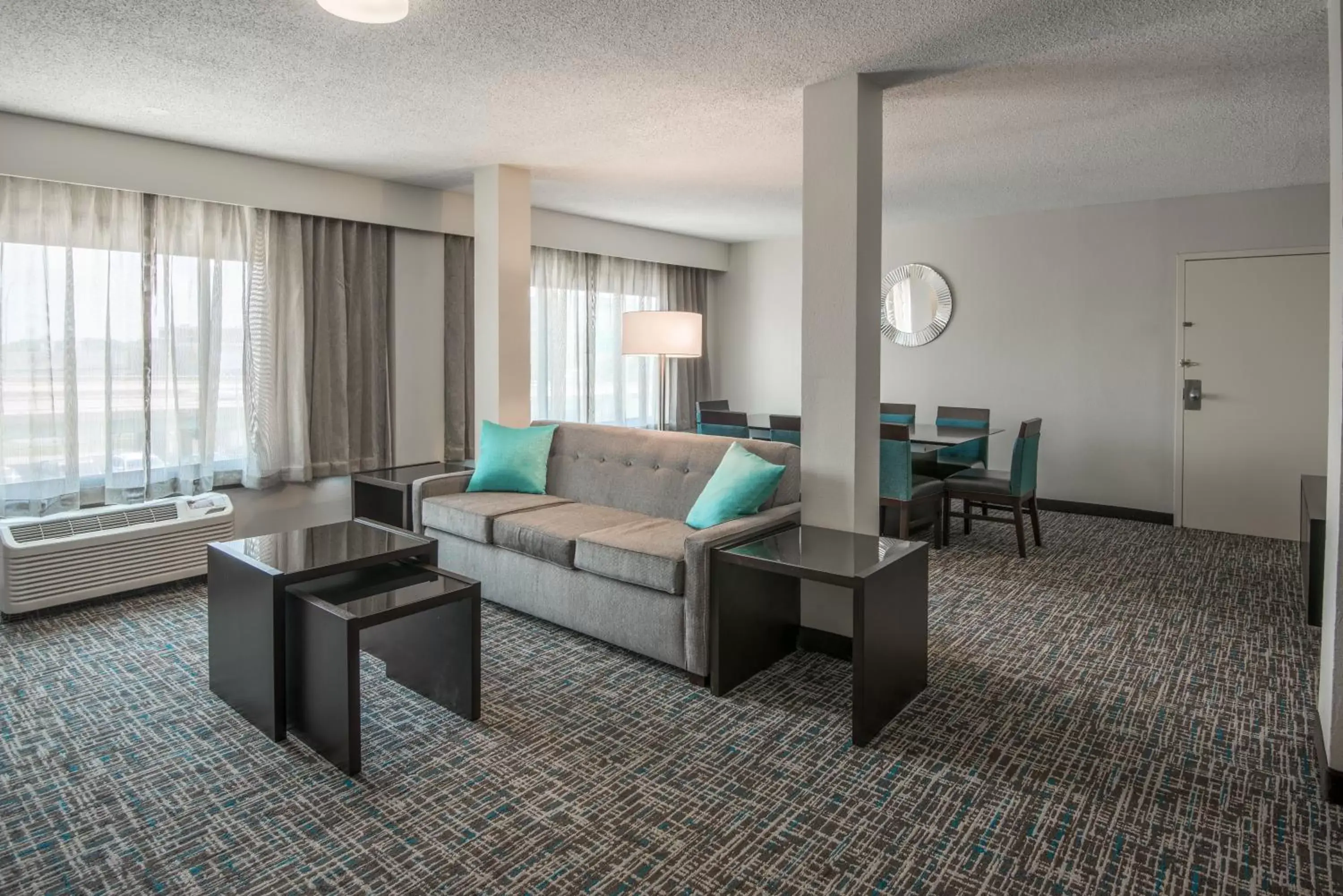 Bedroom, Seating Area in Crowne Plaza Memphis Downtown, an IHG Hotel