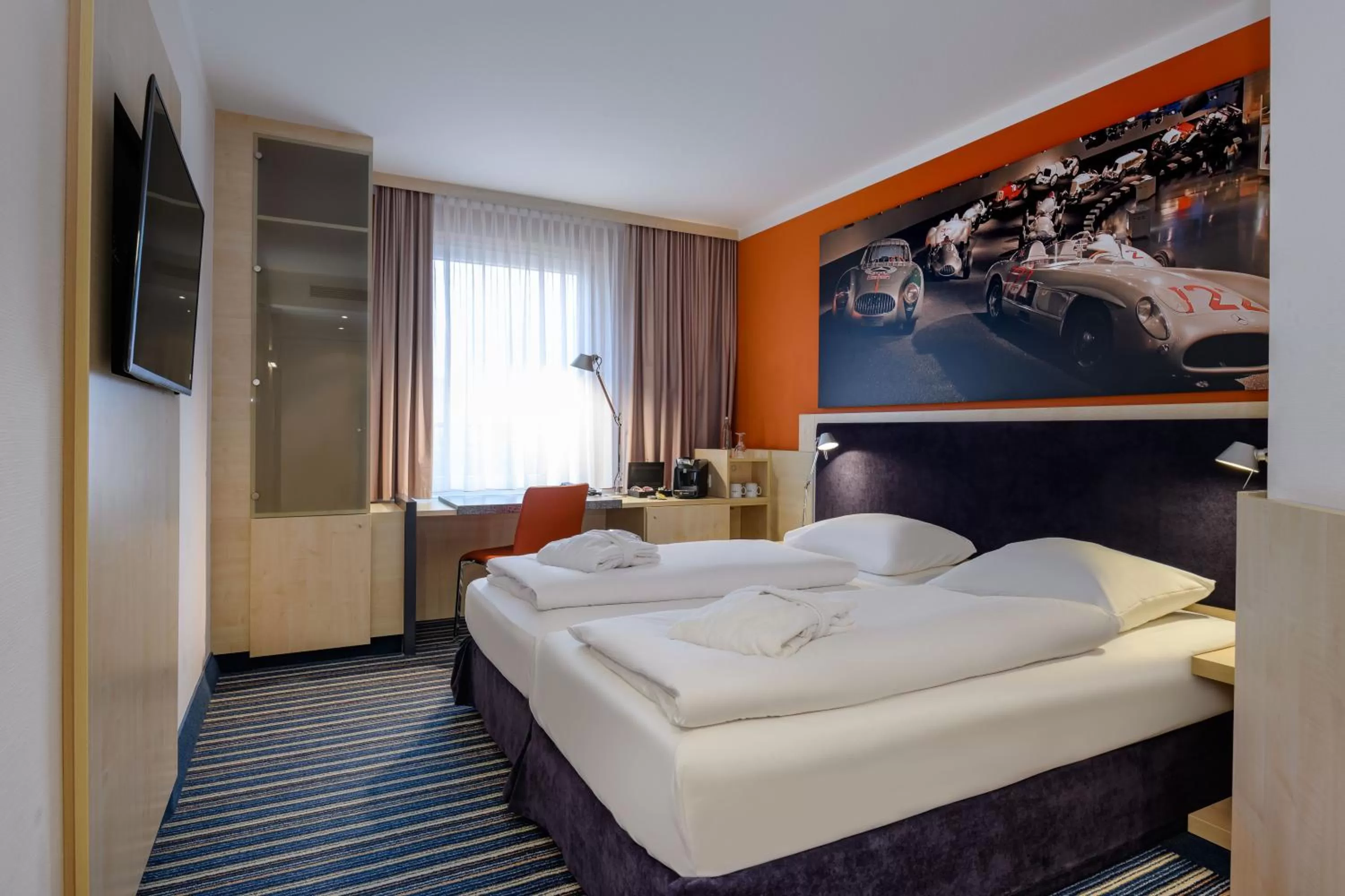 Photo of the whole room, Bed in Mercure Stuttgart City Center