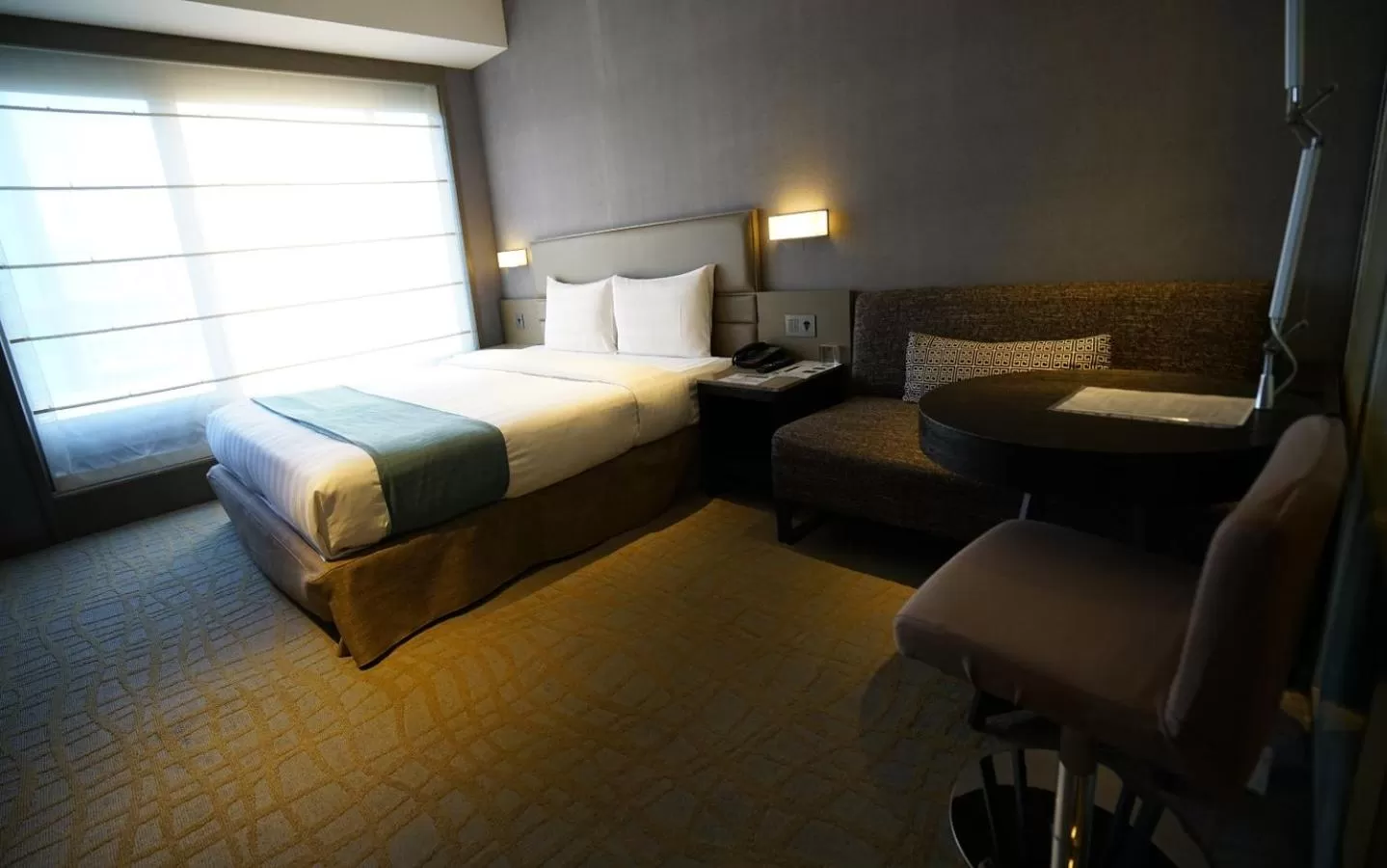 Bed in Hotel Midtown Richardson