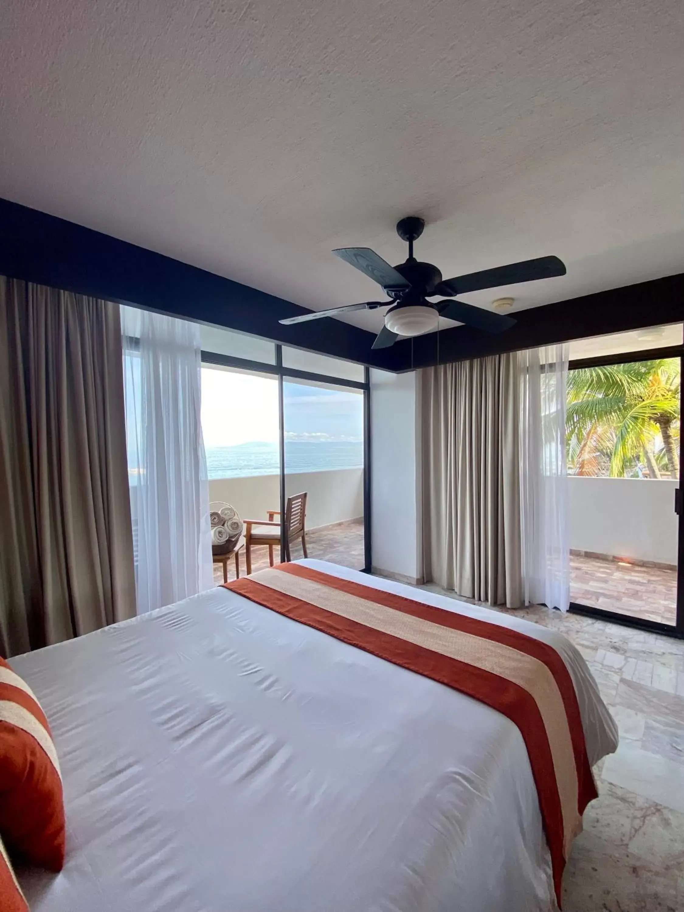 Bed in Costa Sur Resort & Spa