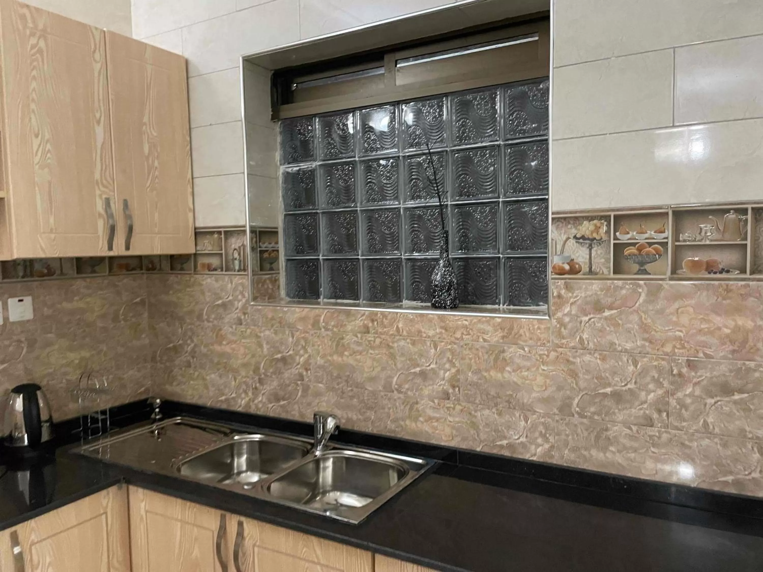 Kitchen or kitchenette in Jaffa Suites